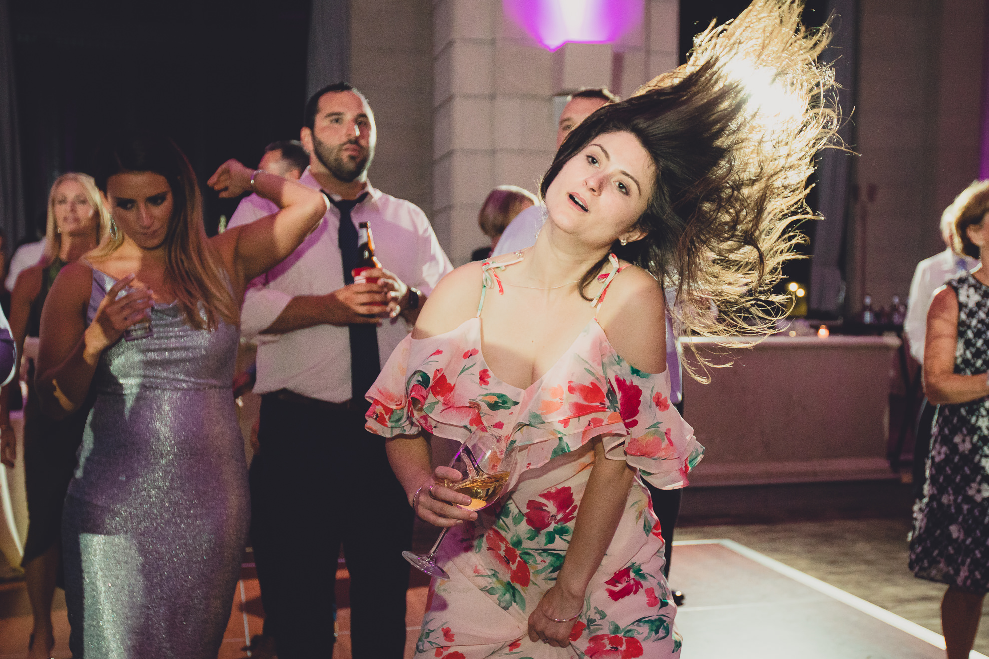 Guests dance in the Admiral Room Ballroom wedding reception venue in downtown Buffalo, NY