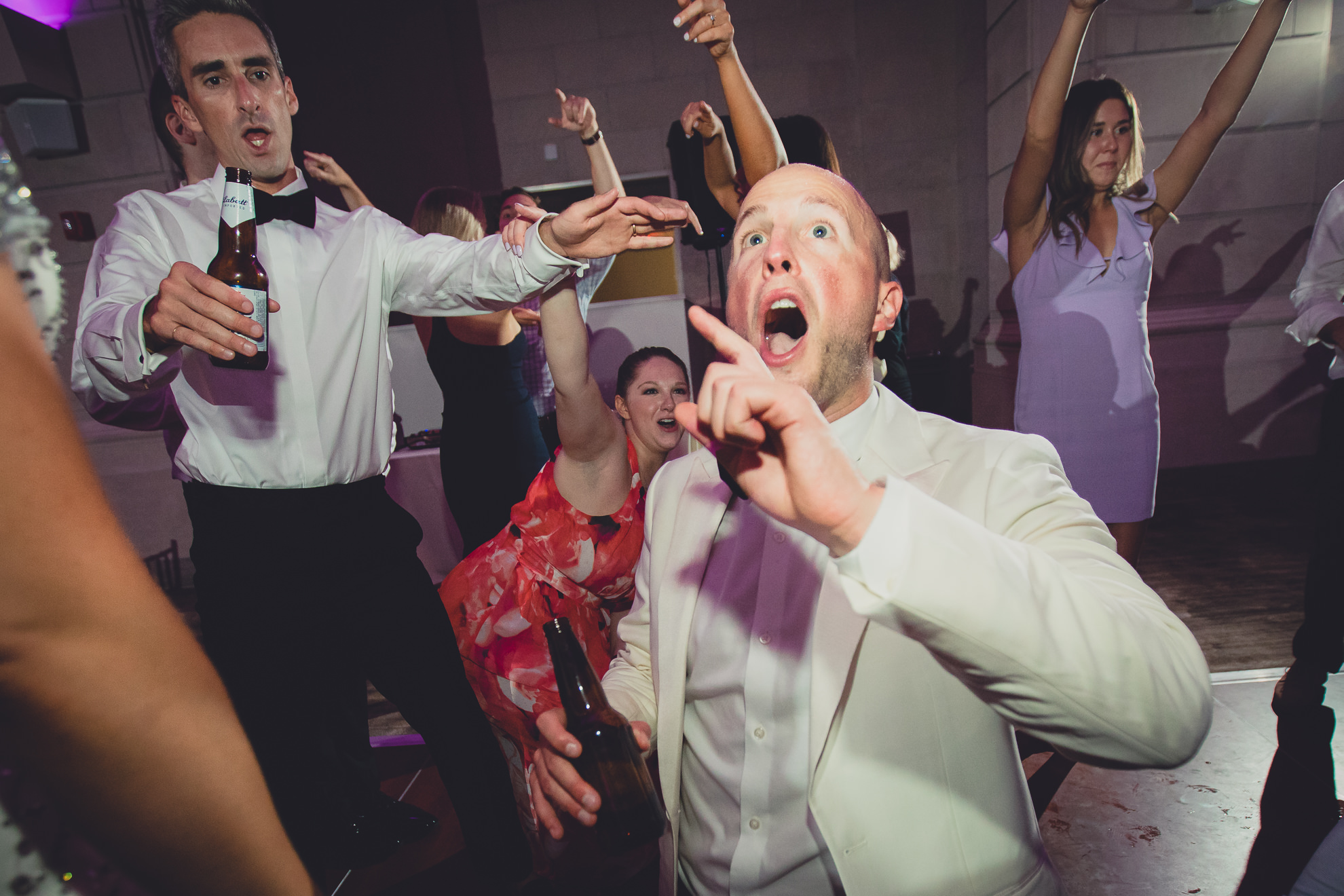 Guests dance in the Admiral Room Ballroom wedding reception venue in downtown Buffalo, NY
