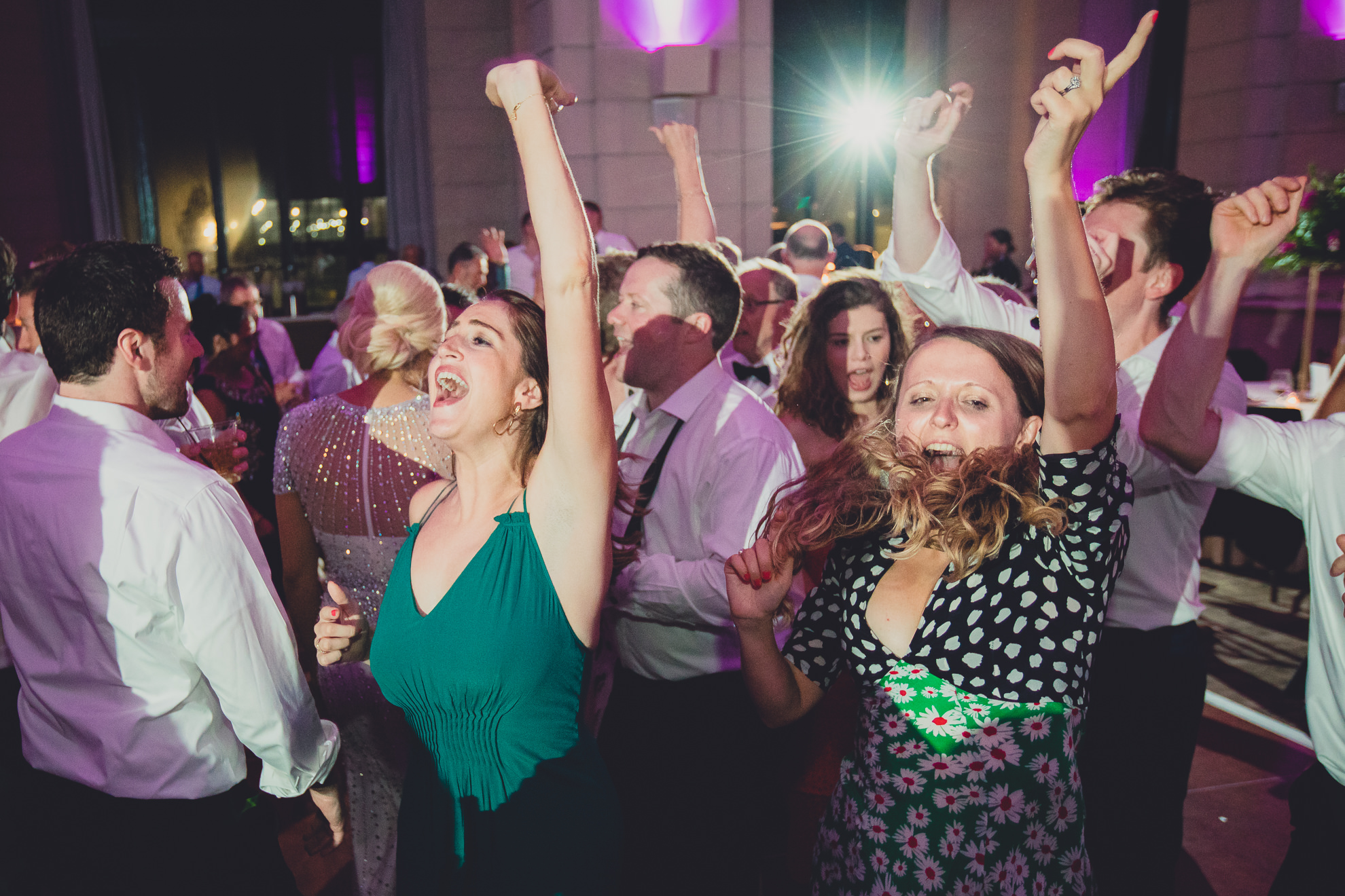 Guests dance in the Admiral Room Ballroom wedding reception venue in downtown Buffalo, NY