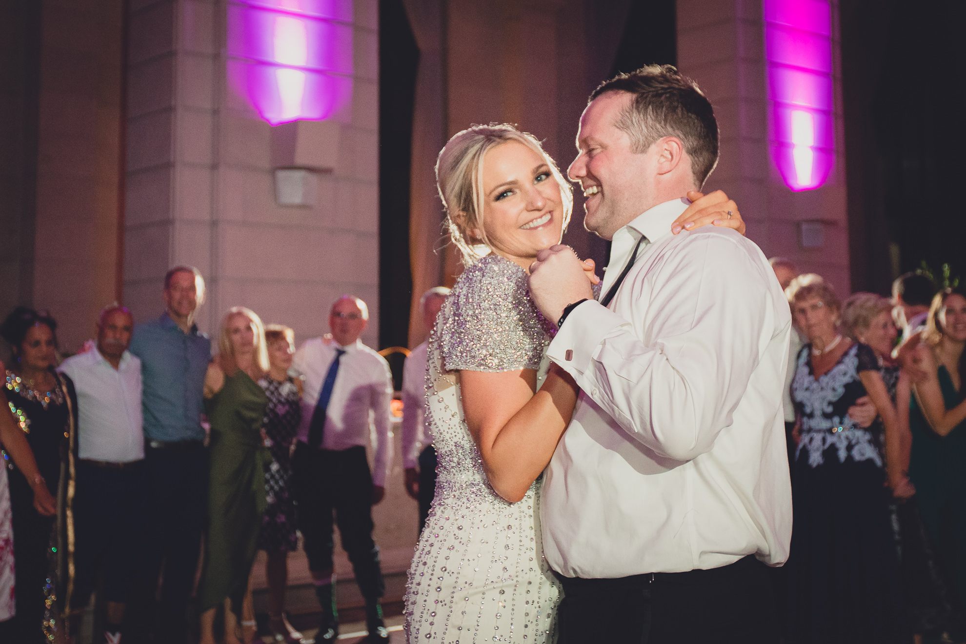 Guests dance in the Admiral Room Ballroom wedding reception venue in downtown Buffalo, NY