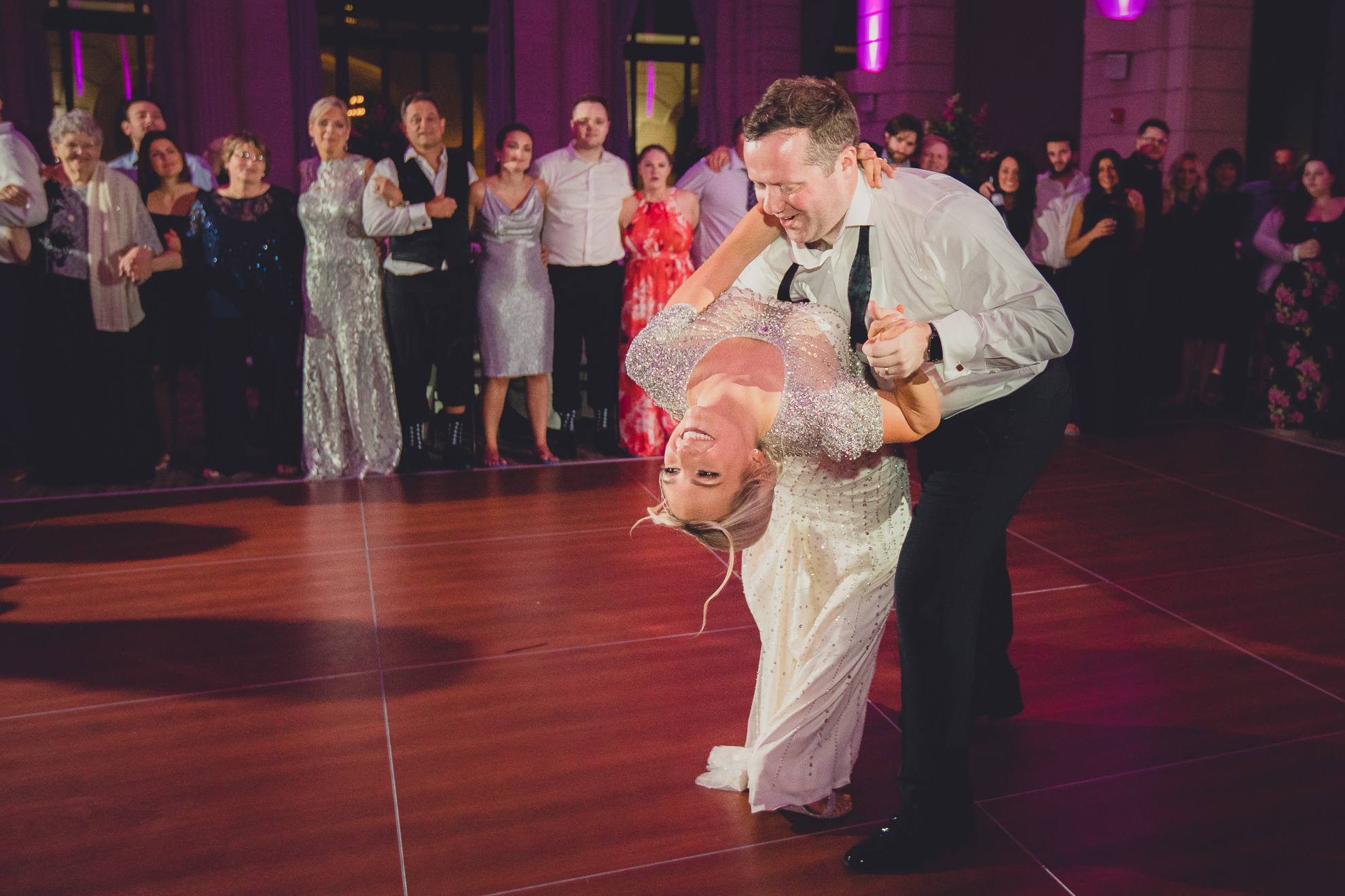 Guests dance in the Admiral Room Ballroom wedding reception venue in downtown Buffalo, NY