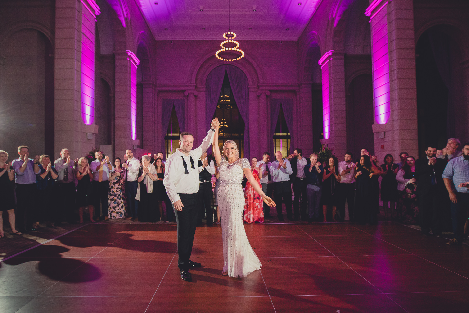 Guests dance in the Admiral Room Ballroom wedding reception venue in downtown Buffalo, NY
