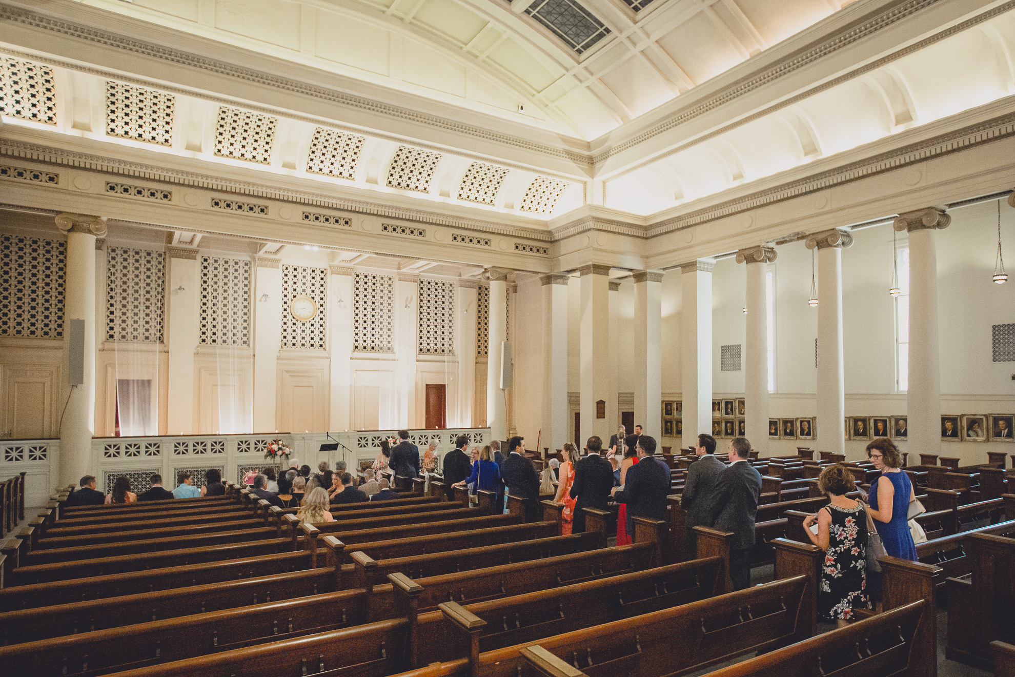 guests enter during wedding ceremony at Karpeles Manuscript Library in Buffalo, NY