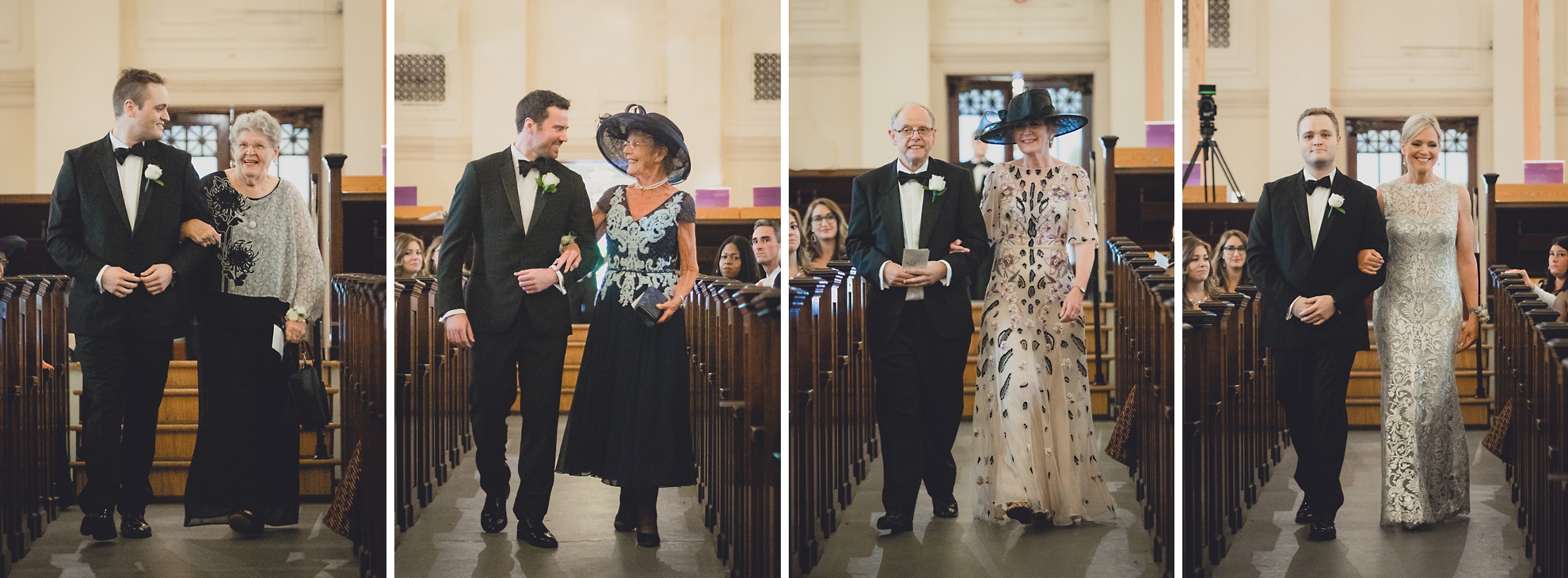 Parents and grandparents are escorted down aisle during wedding ceremony at Karpeles Manuscript Library in Buffalo, NY