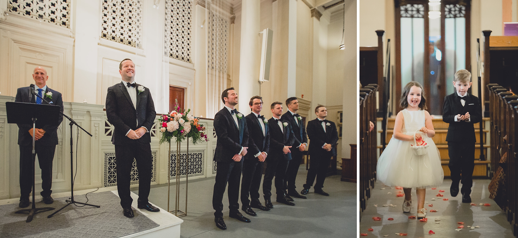 groom smiles as flower girl and ring bearer walk down aisle during wedding ceremony at Karpeles Manuscript Library in Buffalo, NY
