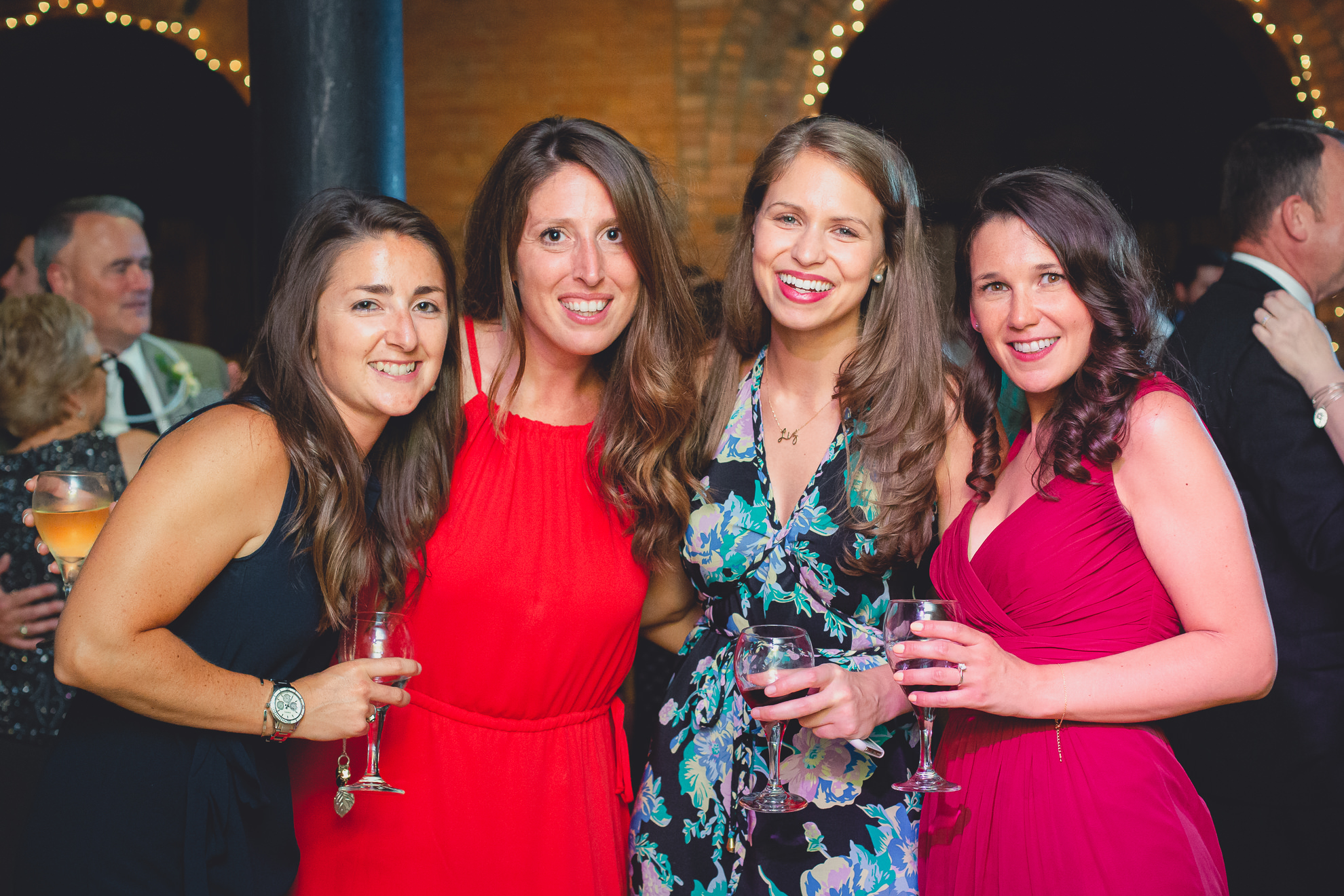 guests pose for photographer at wedding reception venue Pearl at the Webb in Buffalo, NY