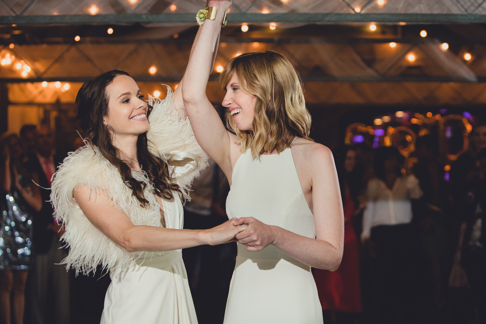 brides dance during wedding at Marcy Casino in Delaware Park in Buffalo, NY