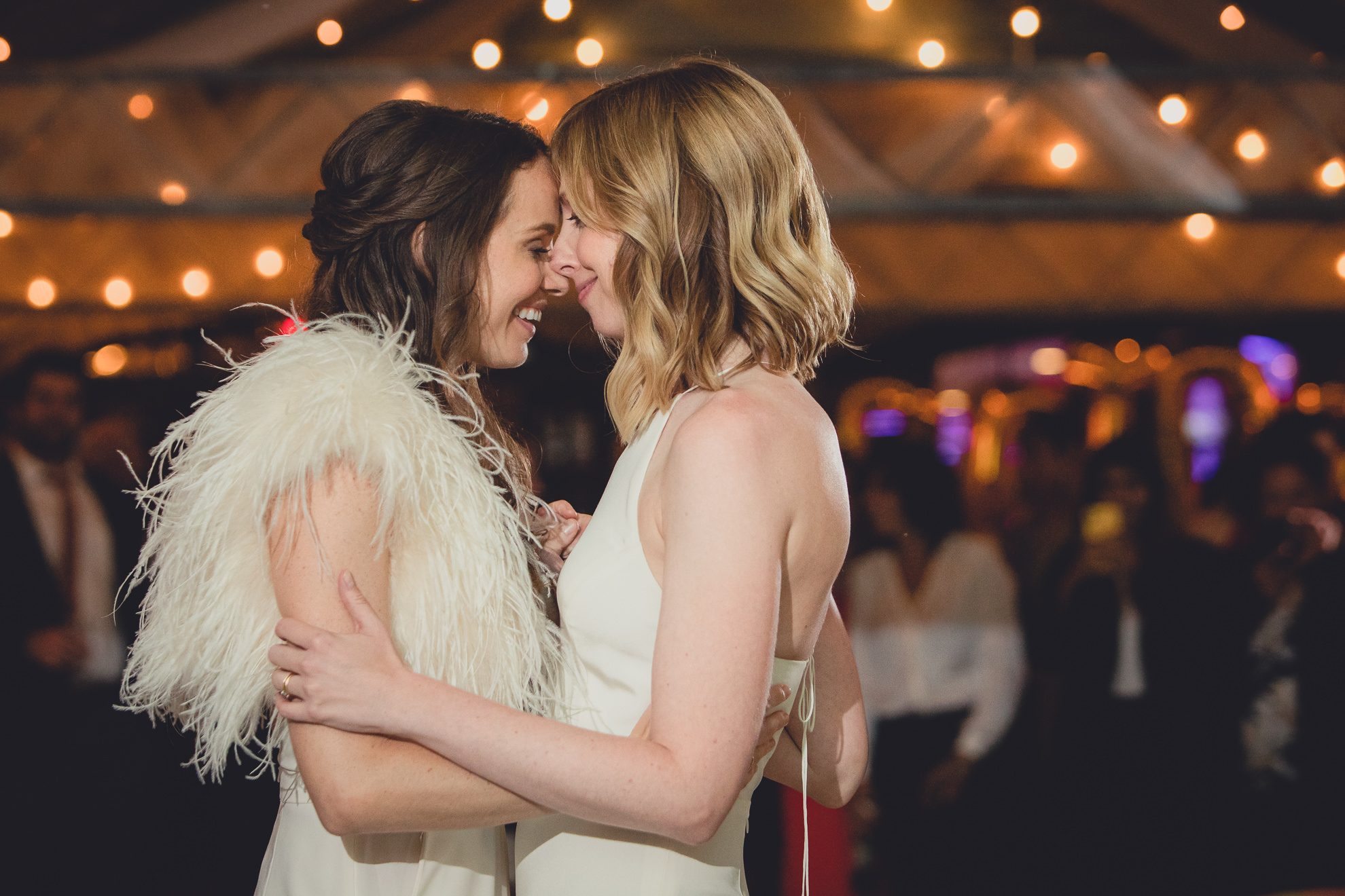 brides dance during wedding at Marcy Casino in Delaware Park in Buffalo, NY