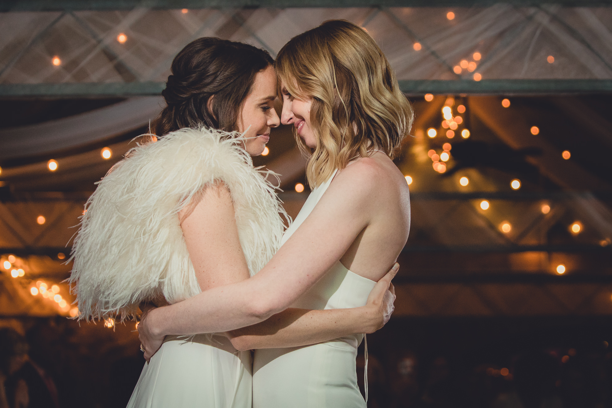 brides dance during wedding at Marcy Casino in Delaware Park in Buffalo, NY