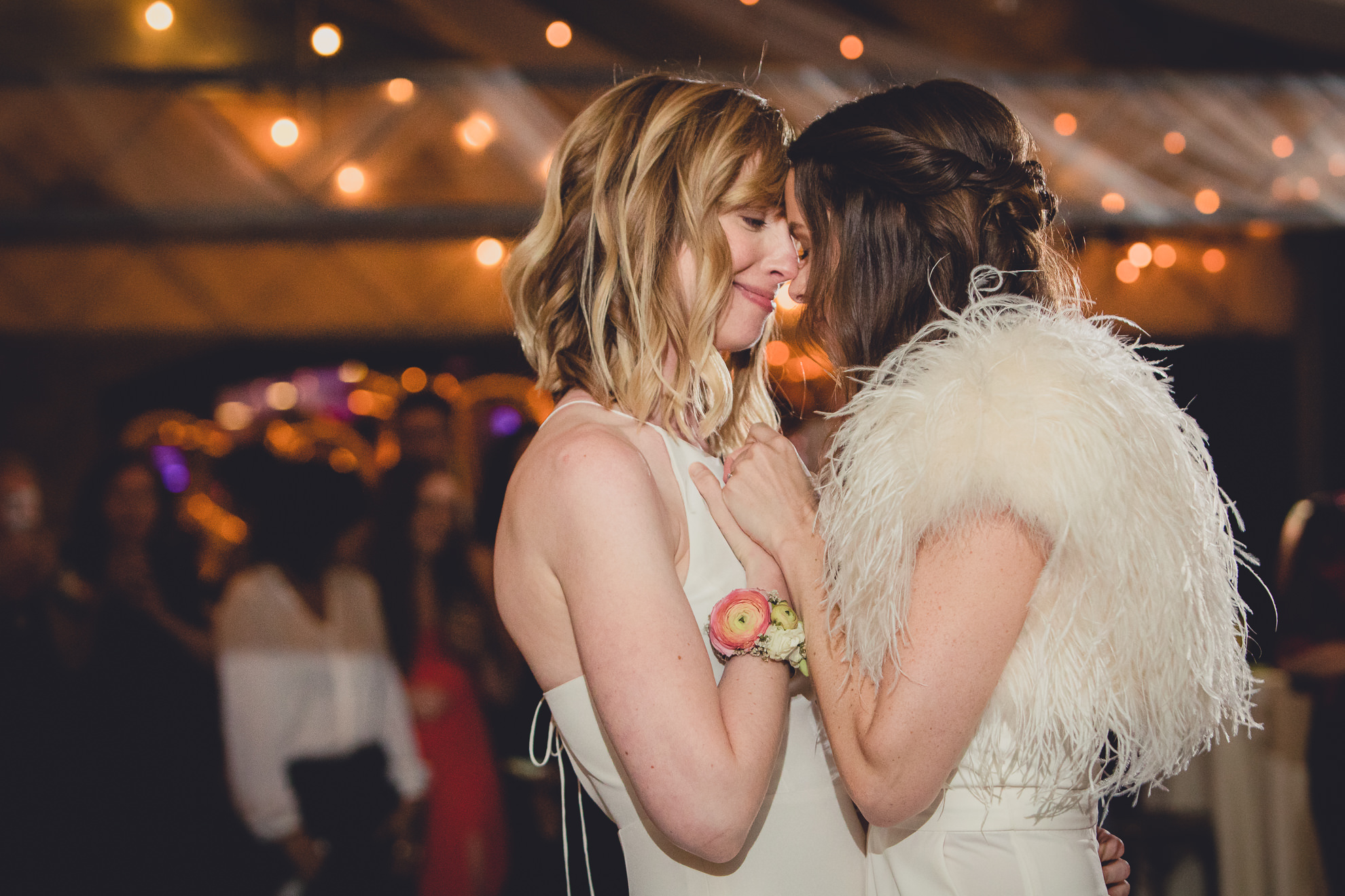 brides dance during wedding at Marcy Casino in Delaware Park in Buffalo, NY