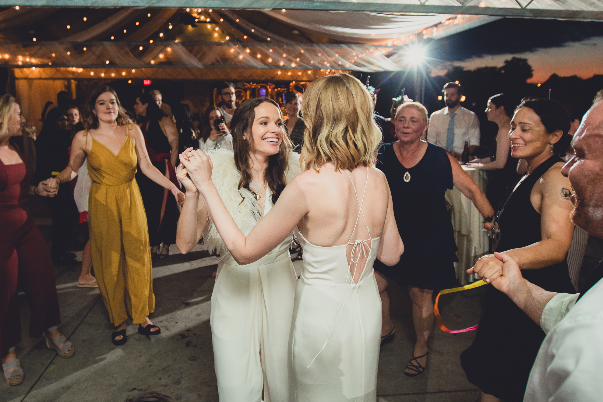 brides dance during wedding at Marcy Casino in Delaware Park in Buffalo, NY