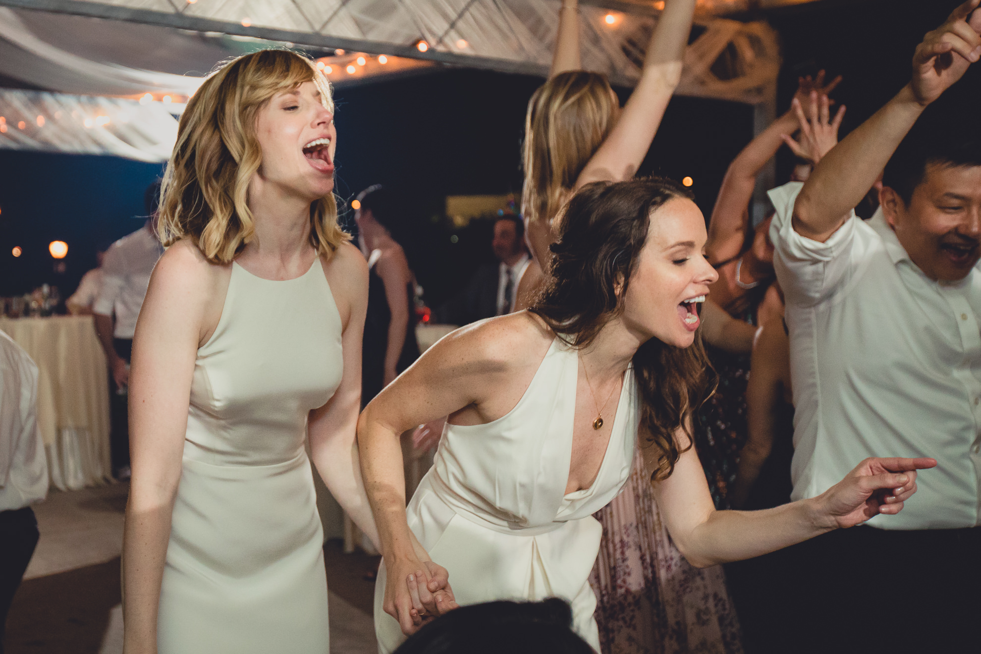brides dance during wedding at Marcy Casino in Delaware Park in Buffalo, NY