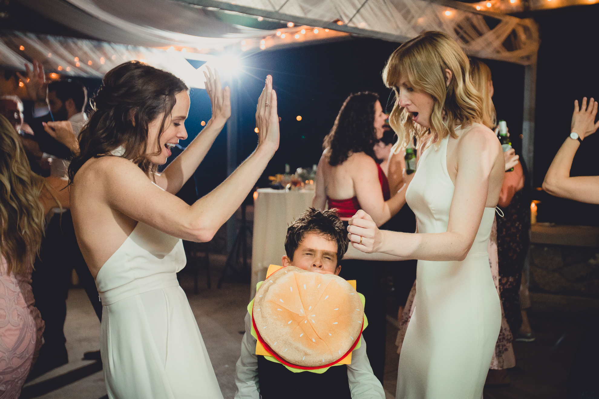 brides dance during wedding at Marcy Casino in Delaware Park in Buffalo, NY