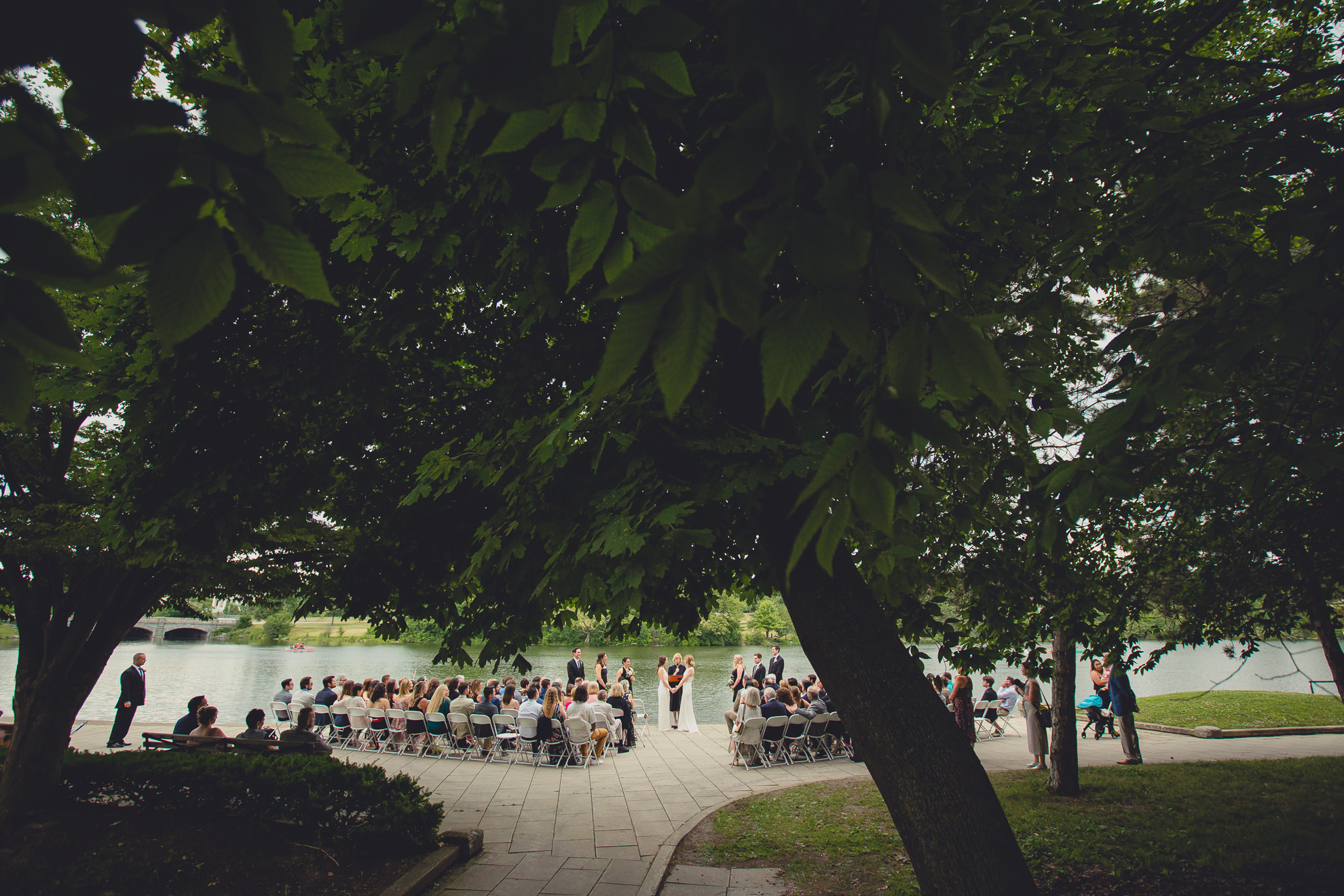 wedding ceremony in front of Hoyt Lake at Marcy Casino in Delaware Park in Buffalo, NY