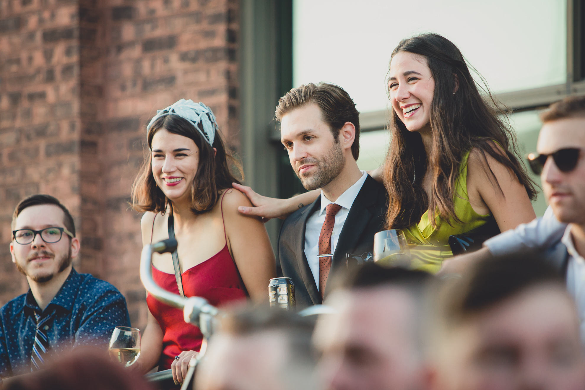 guests react to speeches during outdoor wedding reception at the Revelry in Rochester, NY 