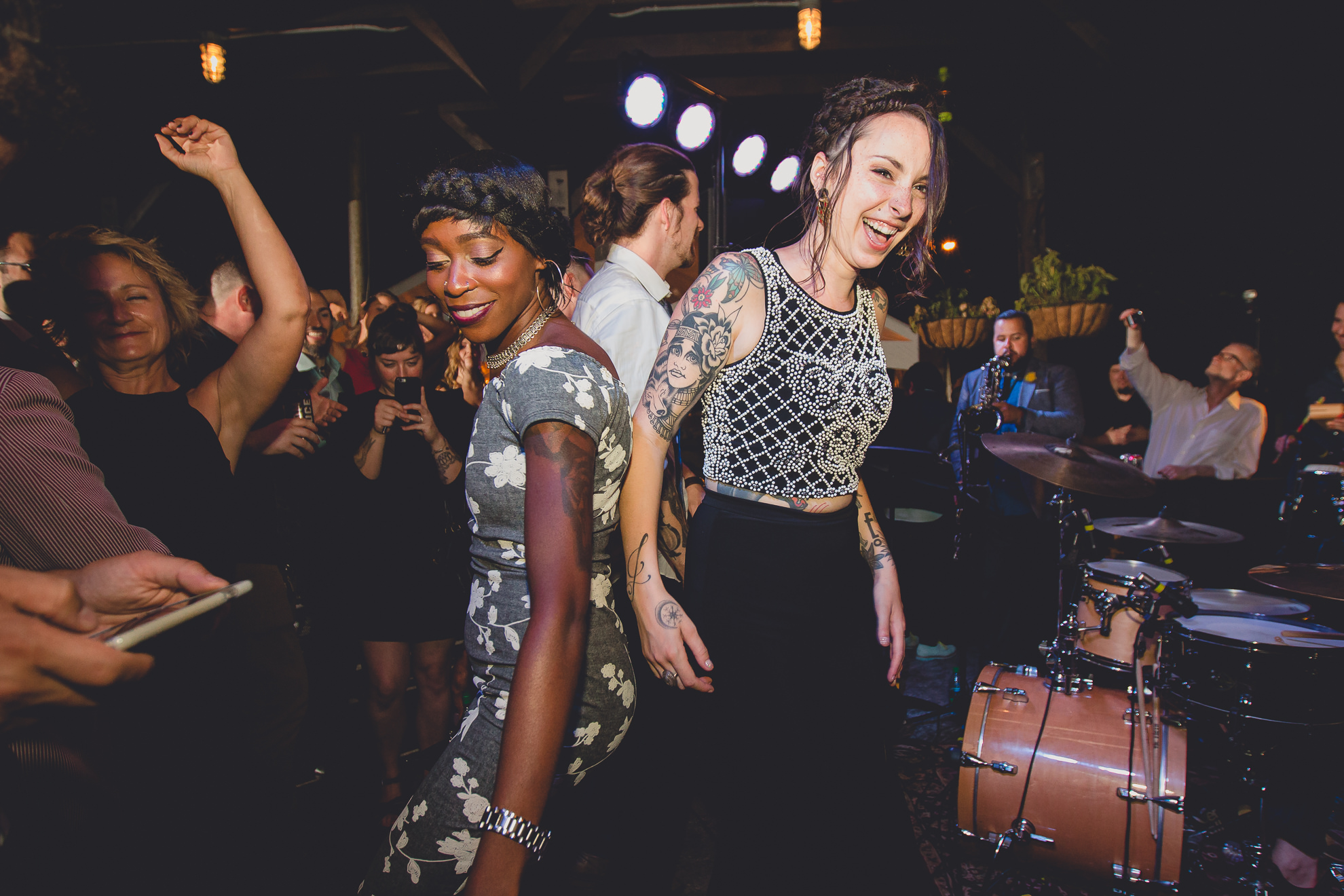 guests dance during outdoor wedding reception at the Revelry in Rochester, NY 