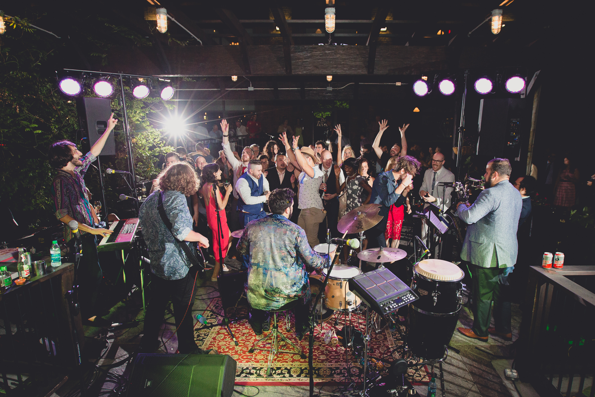 guests dance during outdoor wedding reception at the Revelry in Rochester, NY 
