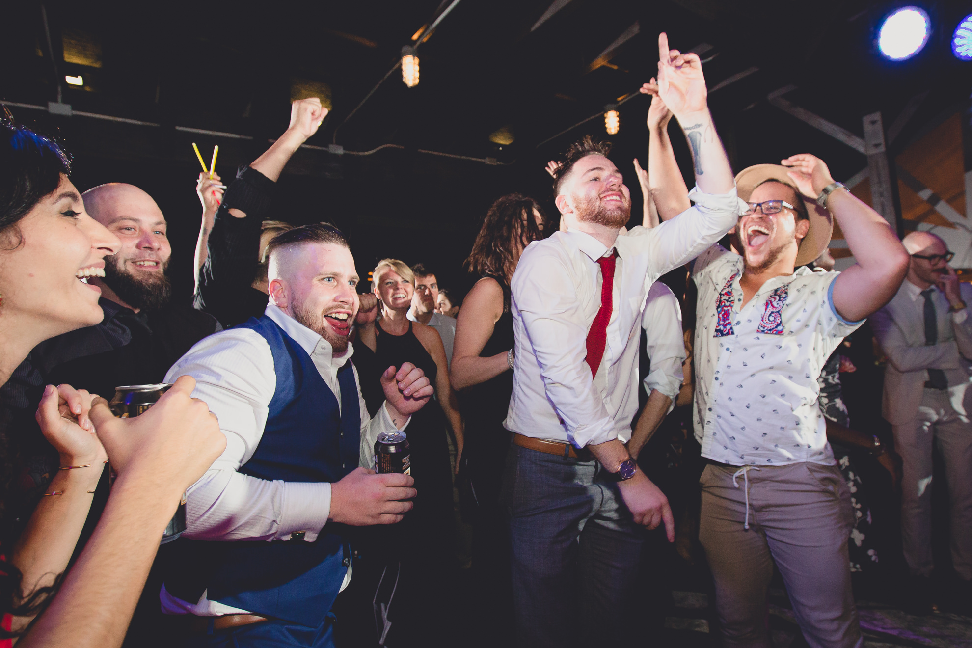 guests dance during outdoor wedding reception at the Revelry in Rochester, NY 