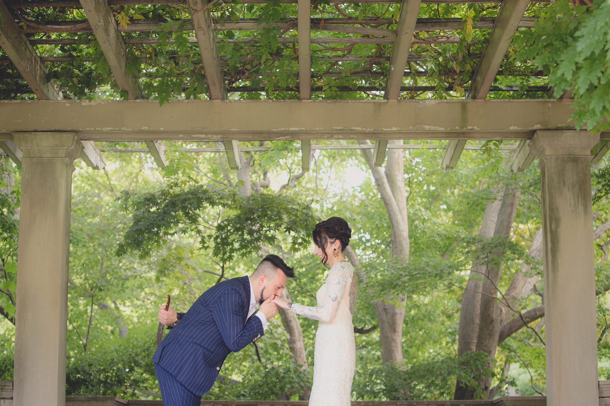 bride and groom see each other for the first time before garden wedding ceremony at the George Eastman House in Rochester, NY 