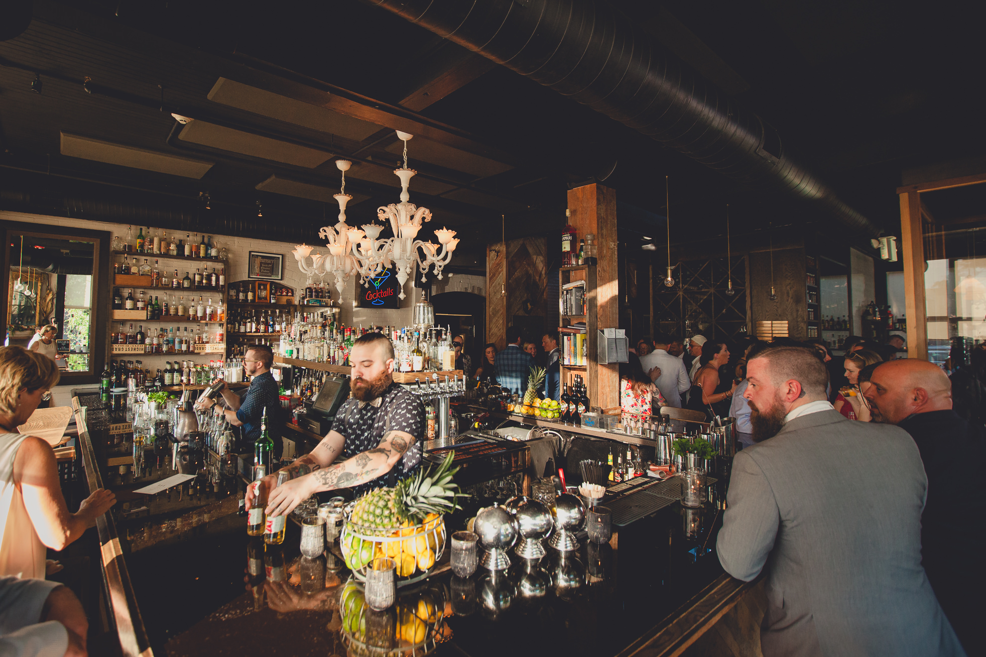 bar scene during outdoor wedding reception at the Revelry in Rochester, NY 