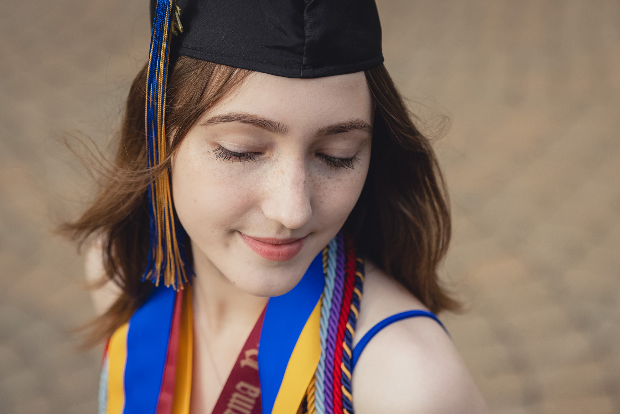 Canisius College senior poses for photographer during graduation portrait photography session on the Canisius campus in Buffalo, NY