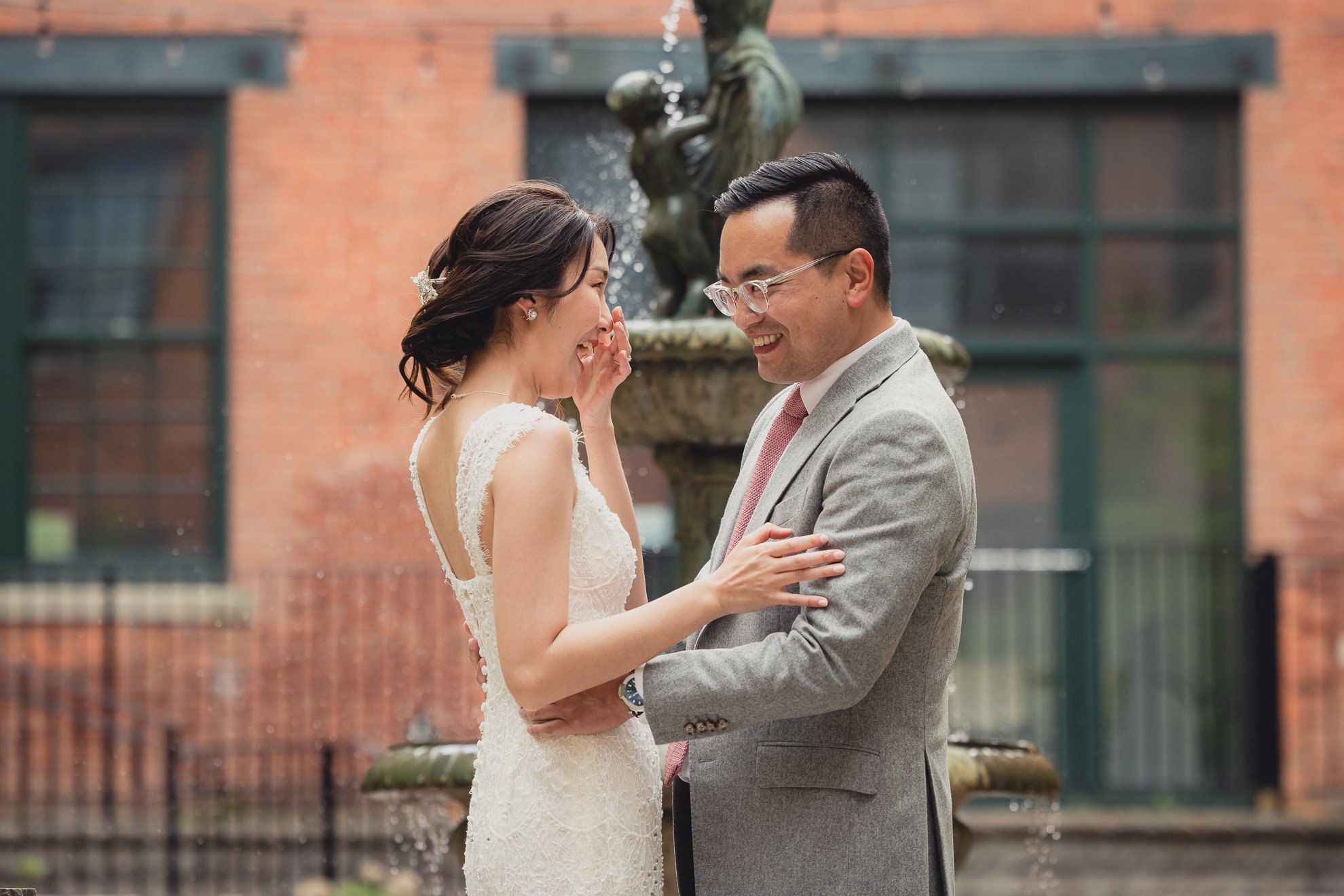 bride and groom see each other for the first time in the courtyard during their wedding at the Foundry Suites in Buffalo, NY