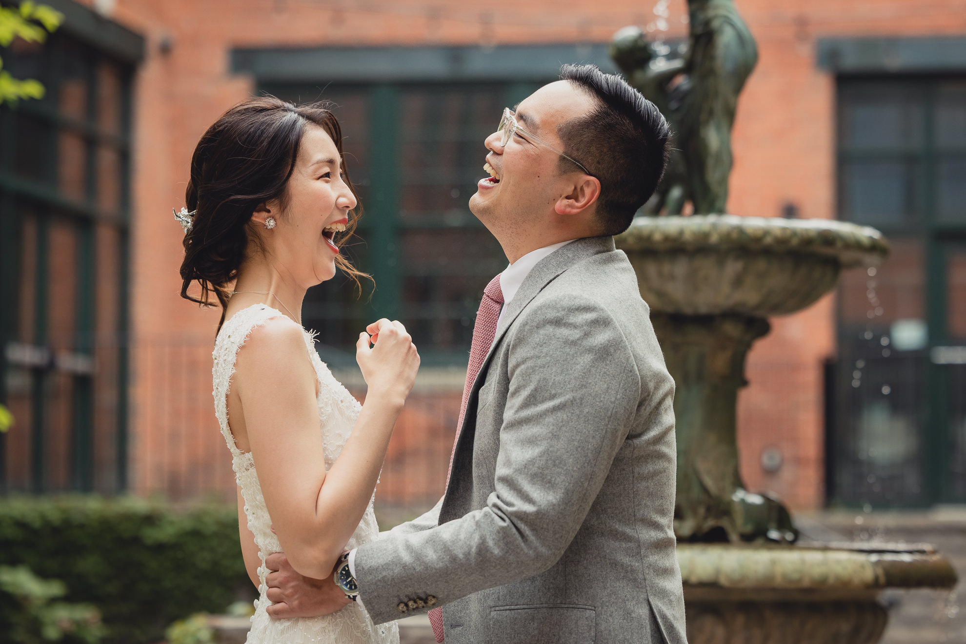 bride and groom see each other for the first time in the courtyard during their wedding at the Foundry Suites in Buffalo, NY
