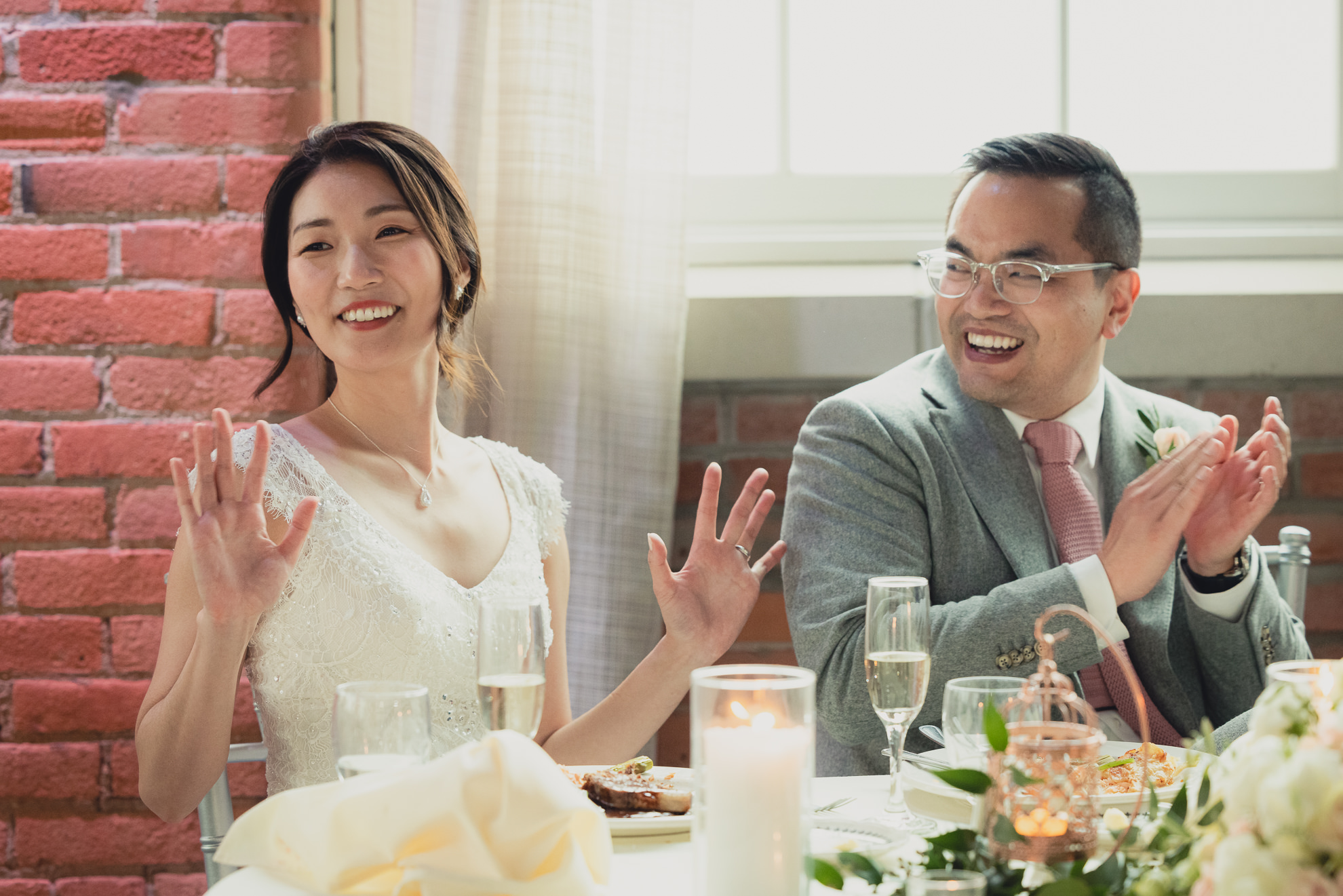 bride and groom laugh during wedding reception at the Foundry Suites in Buffalo, NY