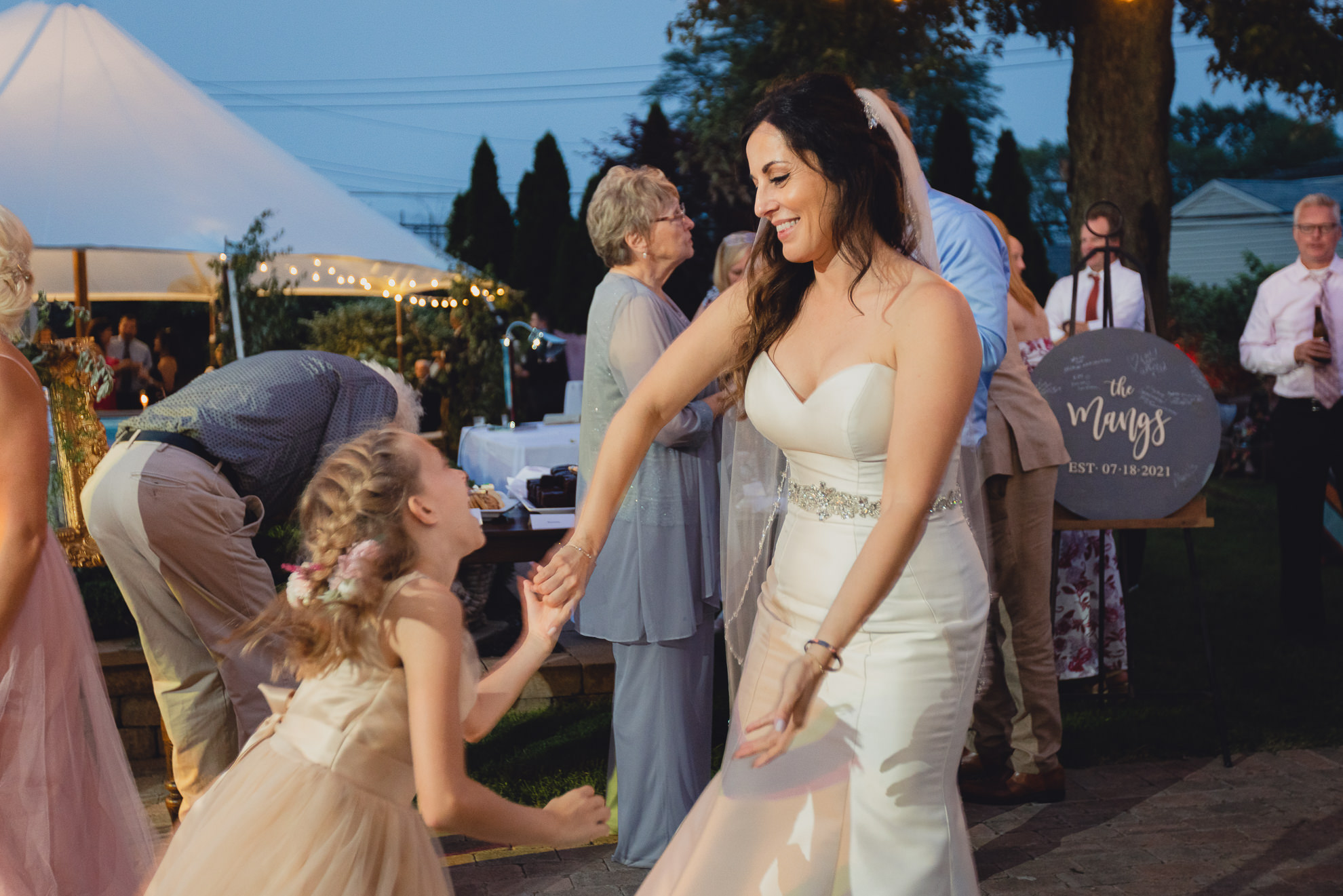 guests dance at backyard tented wedding in Buffalo, NY
