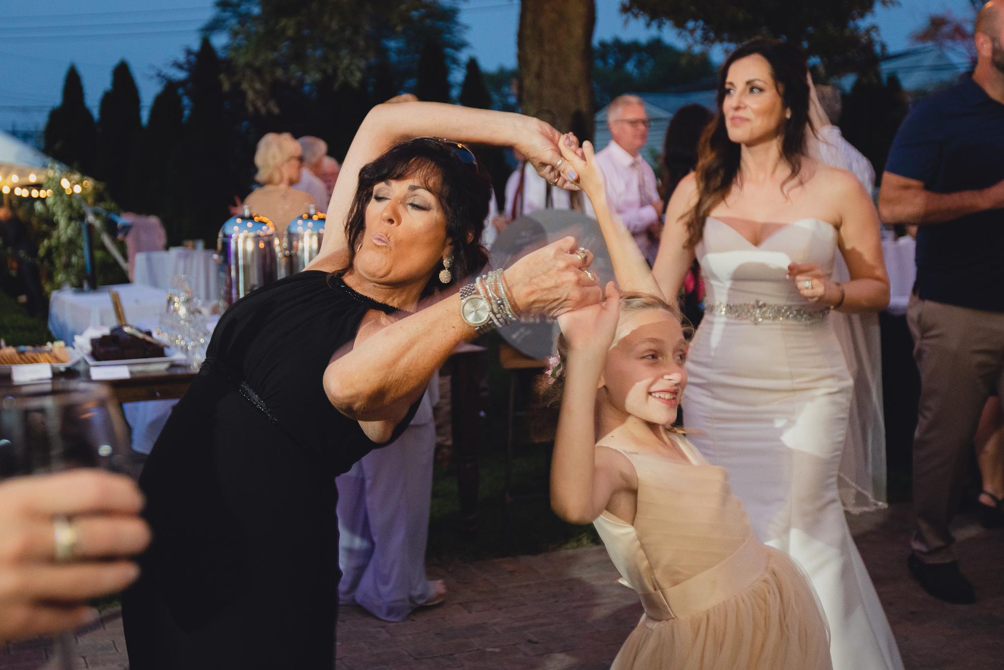 guests dance at backyard tented wedding in Buffalo, NY