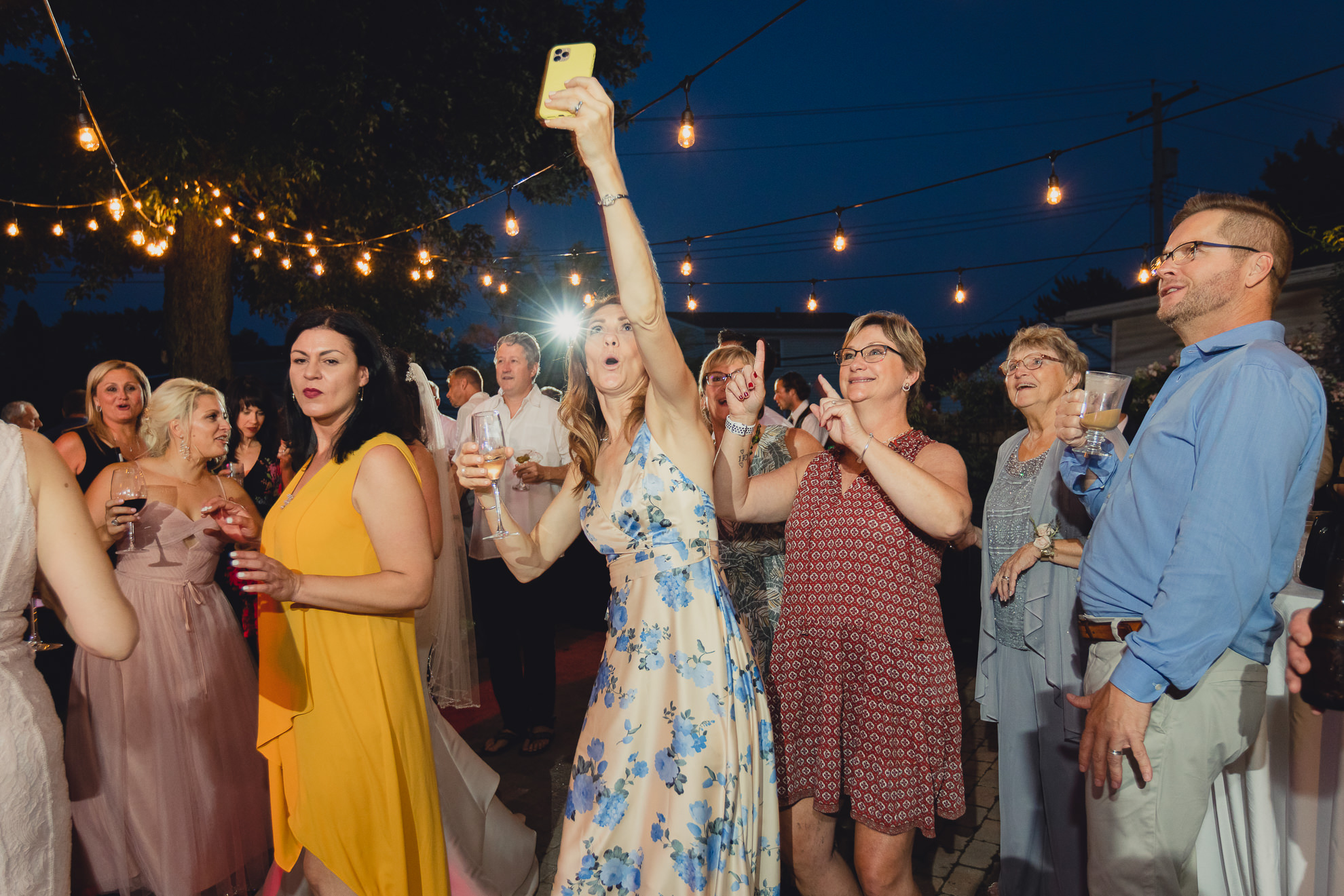 guests dance at backyard tented wedding in Buffalo, NY