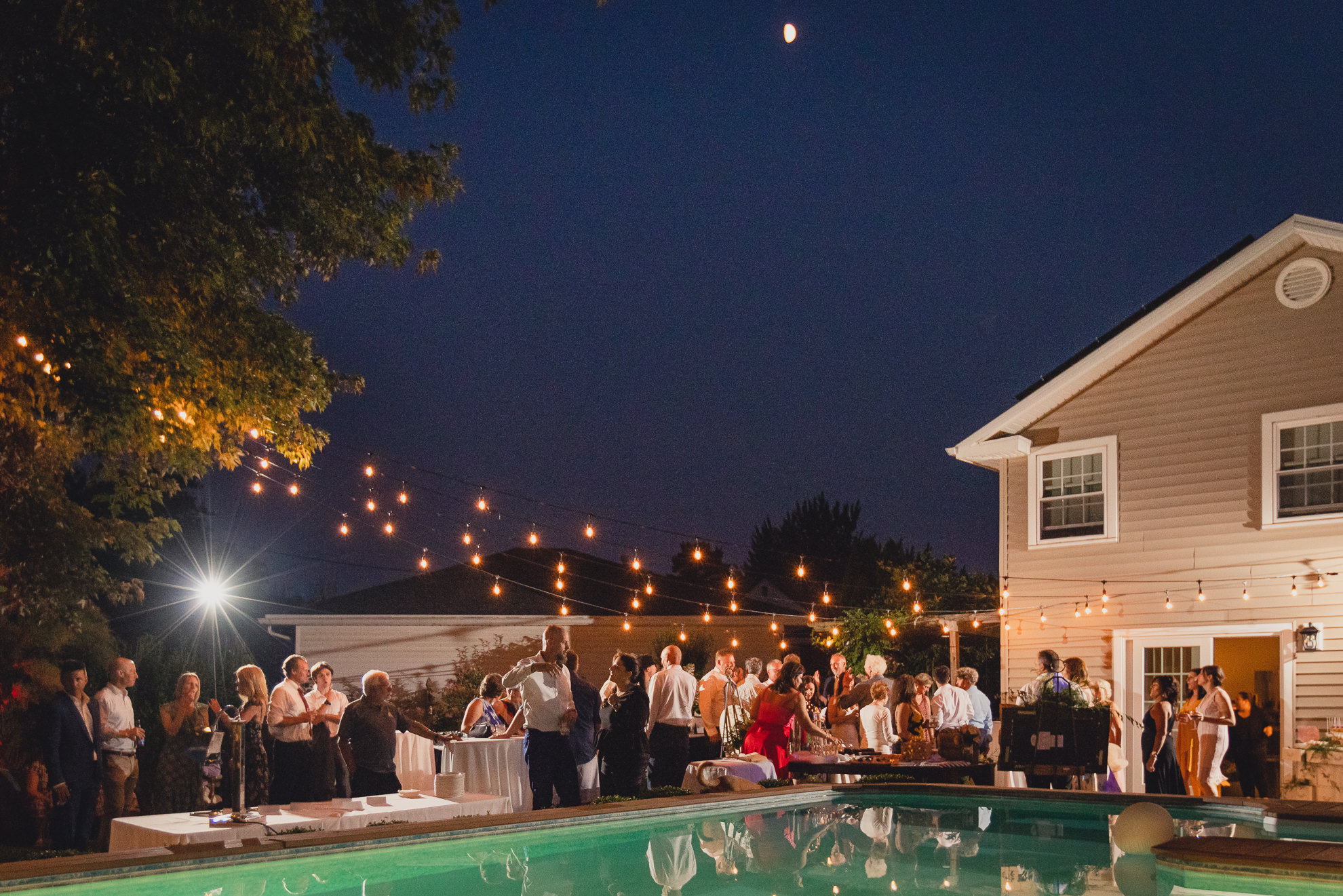 guests dance at backyard tented wedding in Buffalo, NY