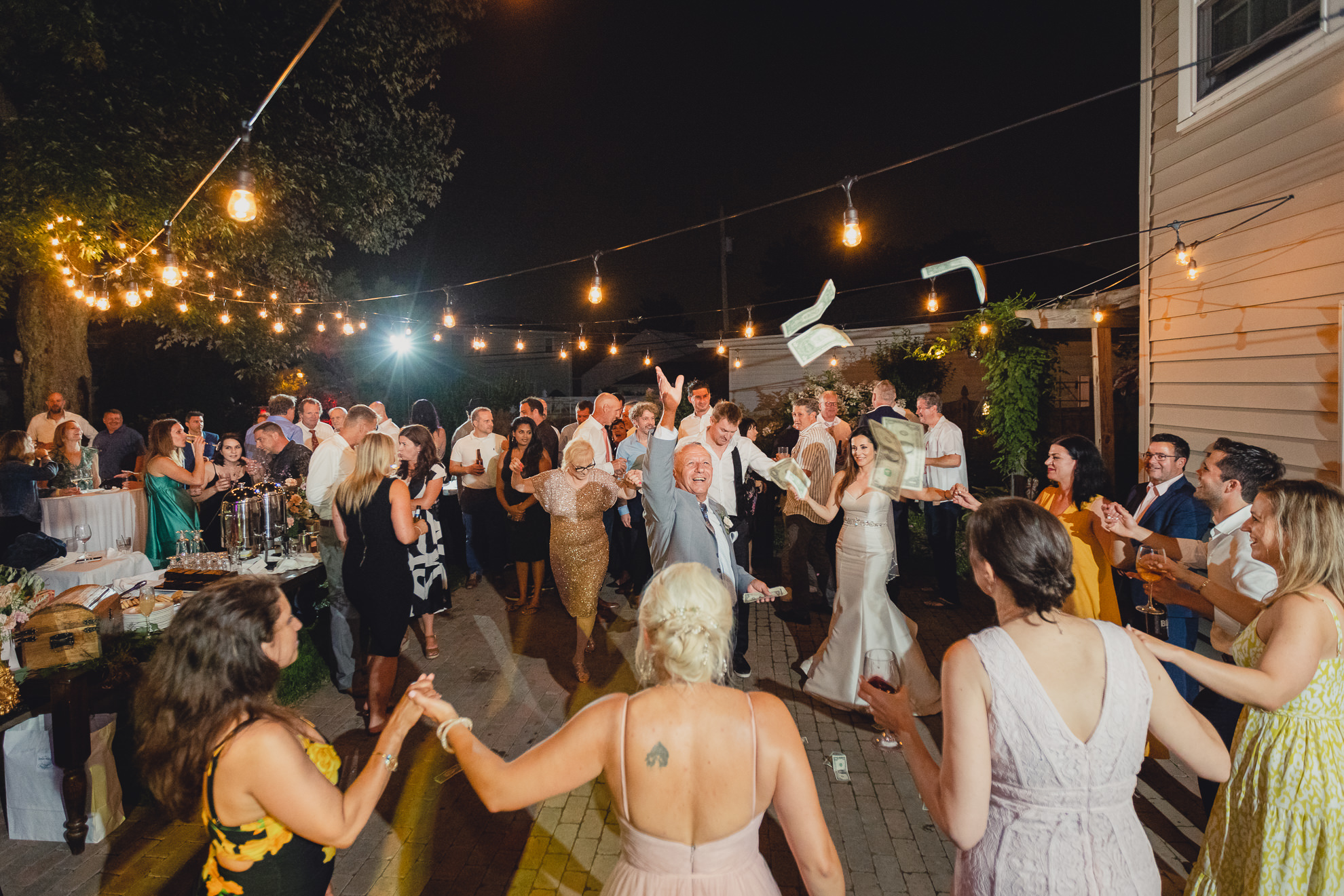 guests dance at backyard tented wedding in Buffalo, NY