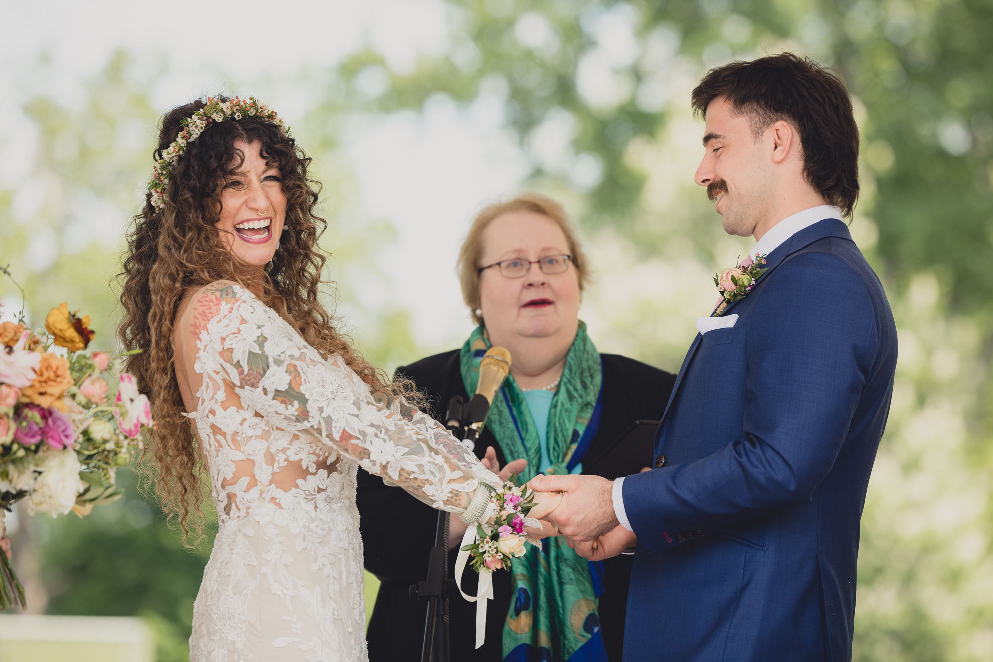 couple laughs at the terrace at marcy casino rose garden wedding ceremony