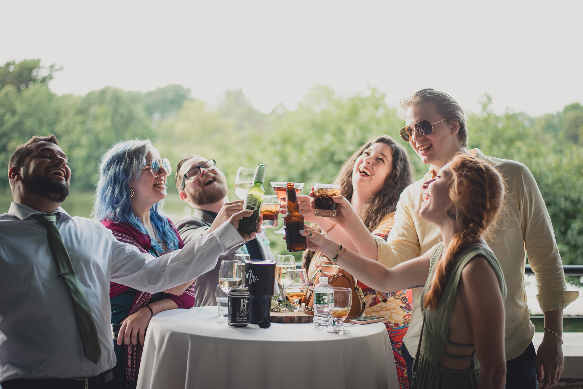 guests toast during cocktail hour during wedding at Marcy Casino in Buffalo, NY