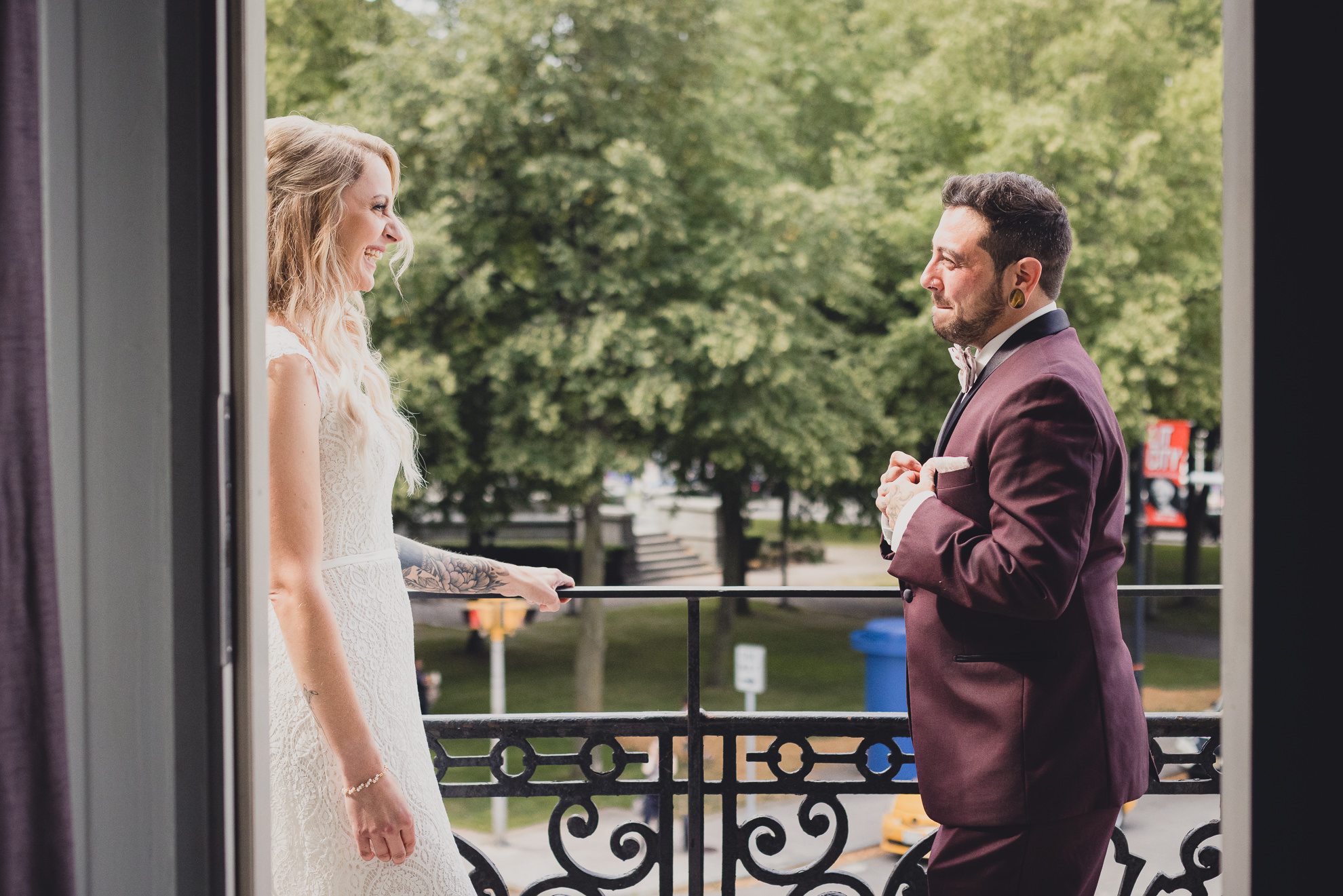 bride and groom share a reveal of first look before wedding at Hotel Lafayette in Buffalo, NY