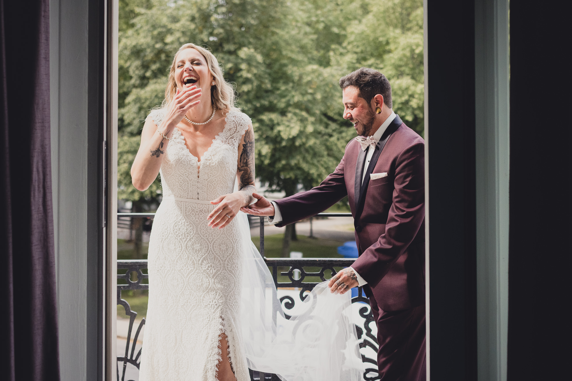 bride and groom share a reveal of first look before wedding at Hotel Lafayette in Buffalo, NY