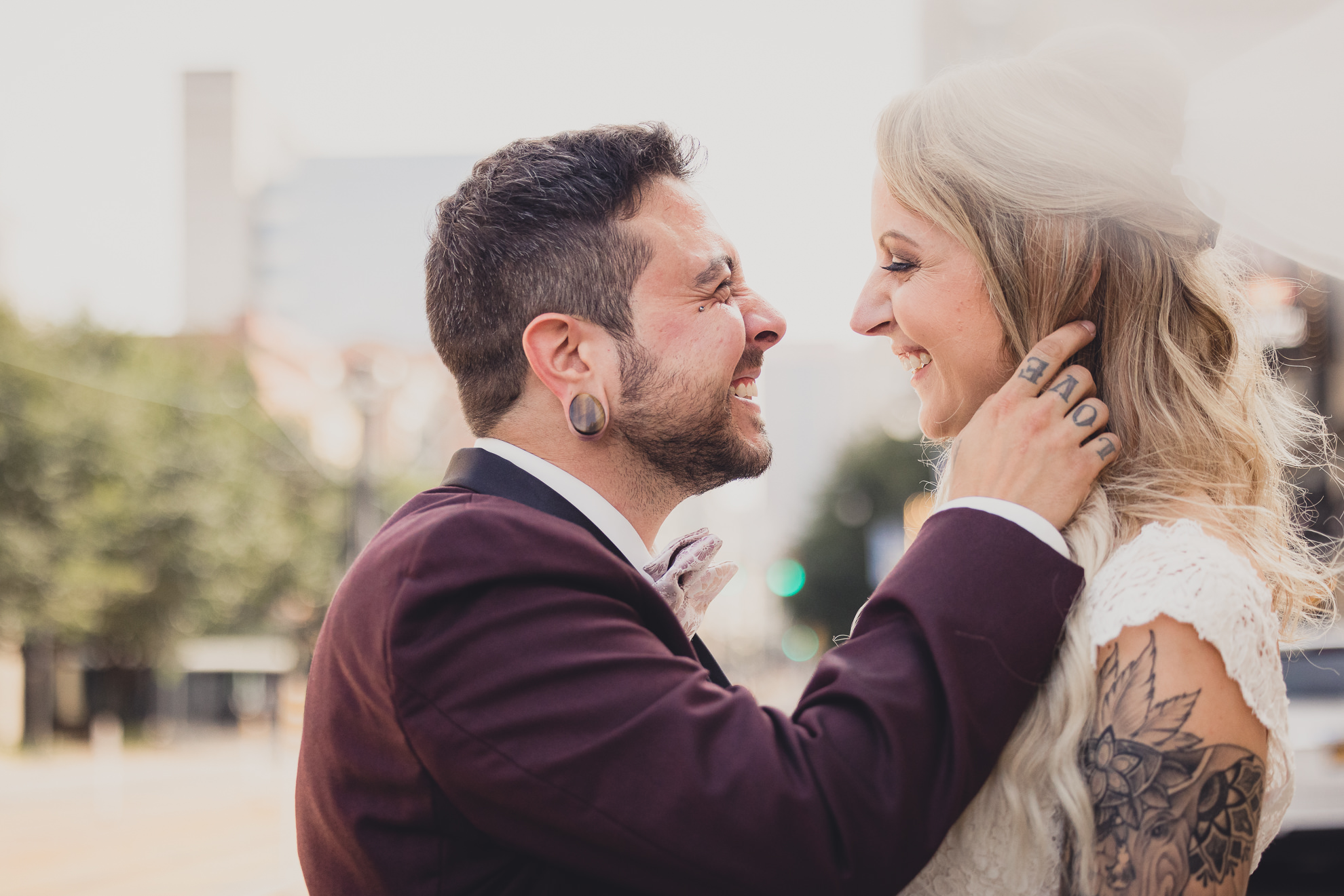 bride and groom pose for wedding portraits near Shea's theater in Buffalo, NY