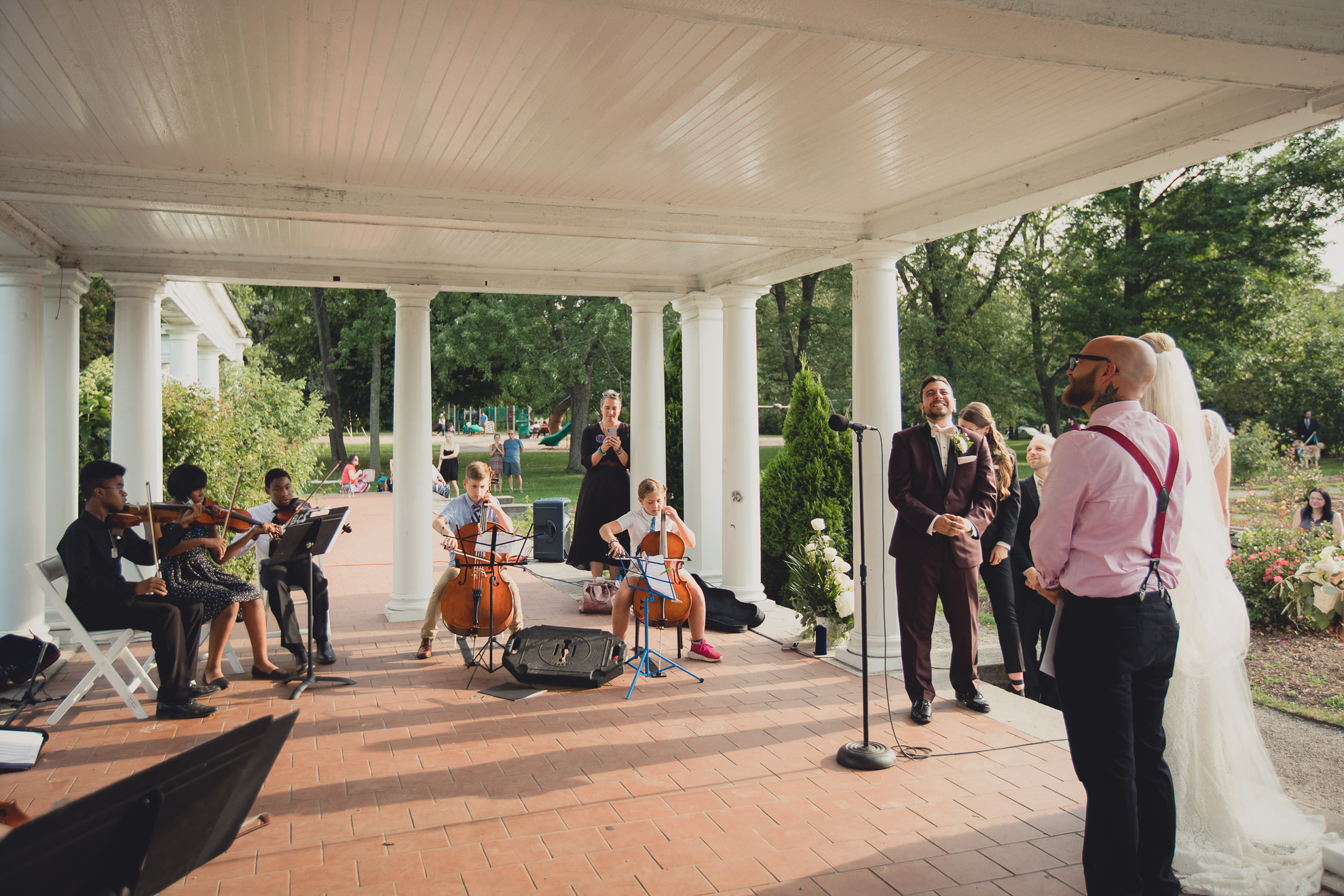 Buffalo String Works performs during wedding ceremony in rose garden at Marcy Casino in Buffalo, NY