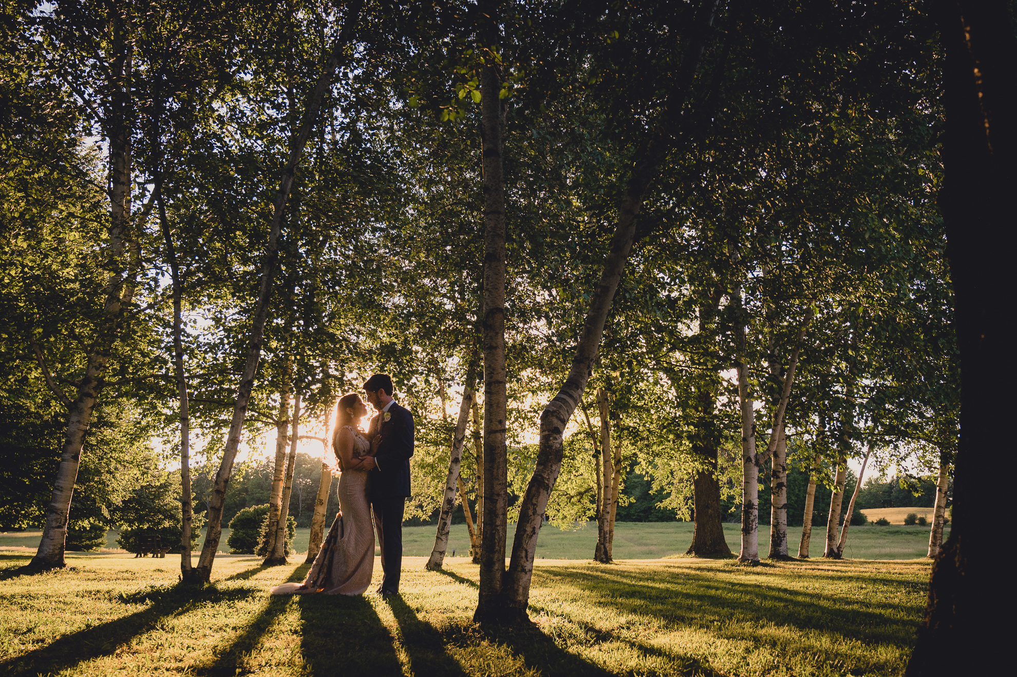 bride and groom pose for portrait after wedding ceremony at mansion at Knox Farm in East Aurora, NY