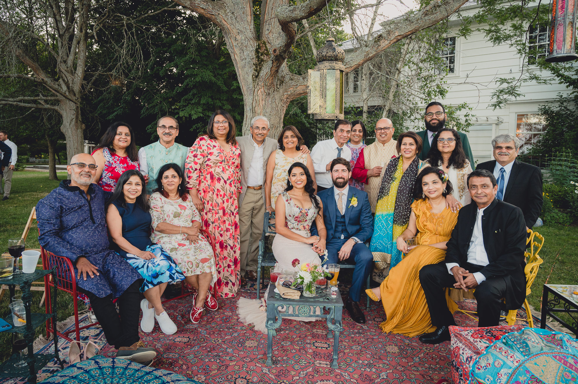 guests pose for portrait at outdoor tented wedding reception at Knox Farm in East Aurora, NY