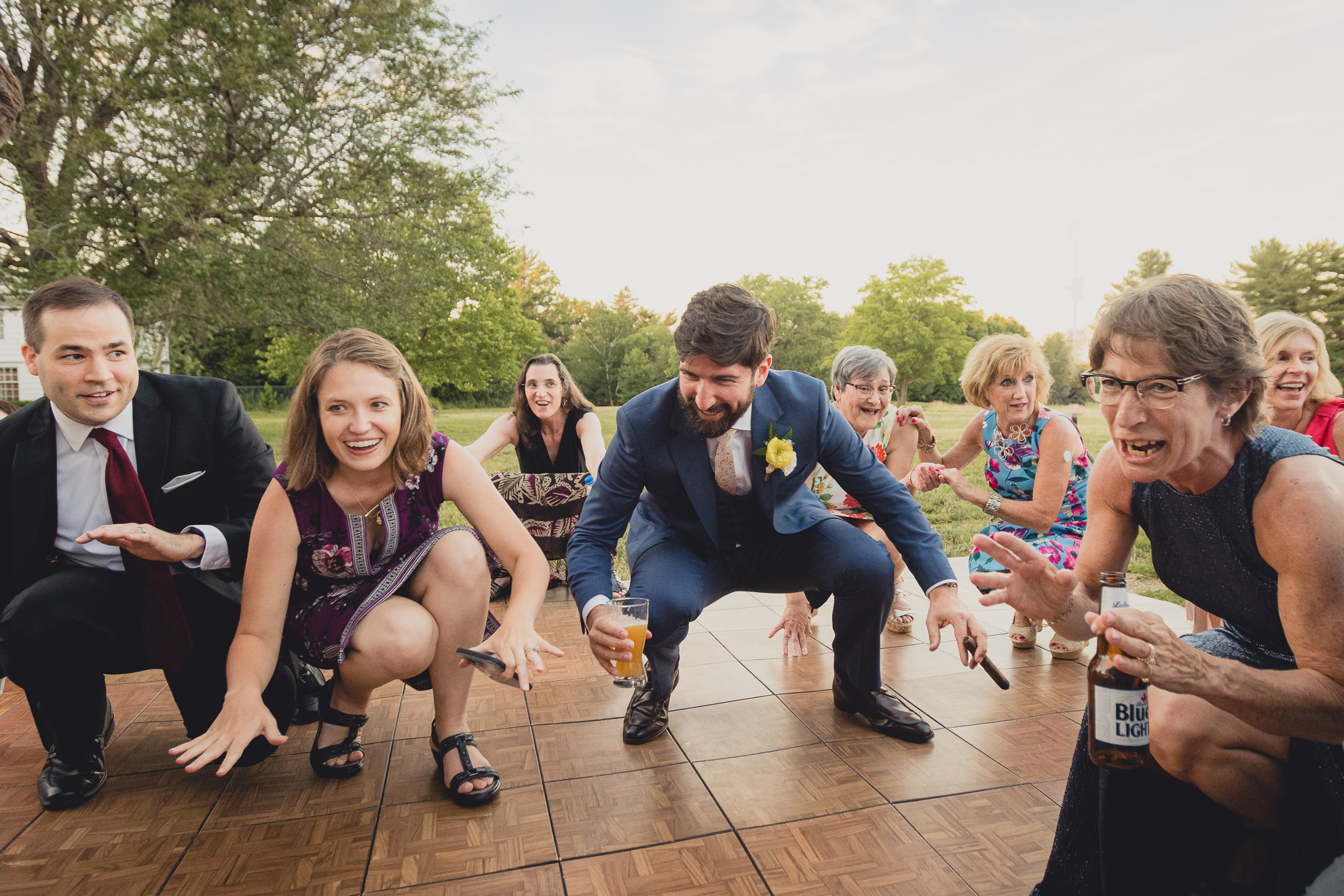 guests dance at outdoor tented wedding reception at Knox Farm in East Aurora, NY