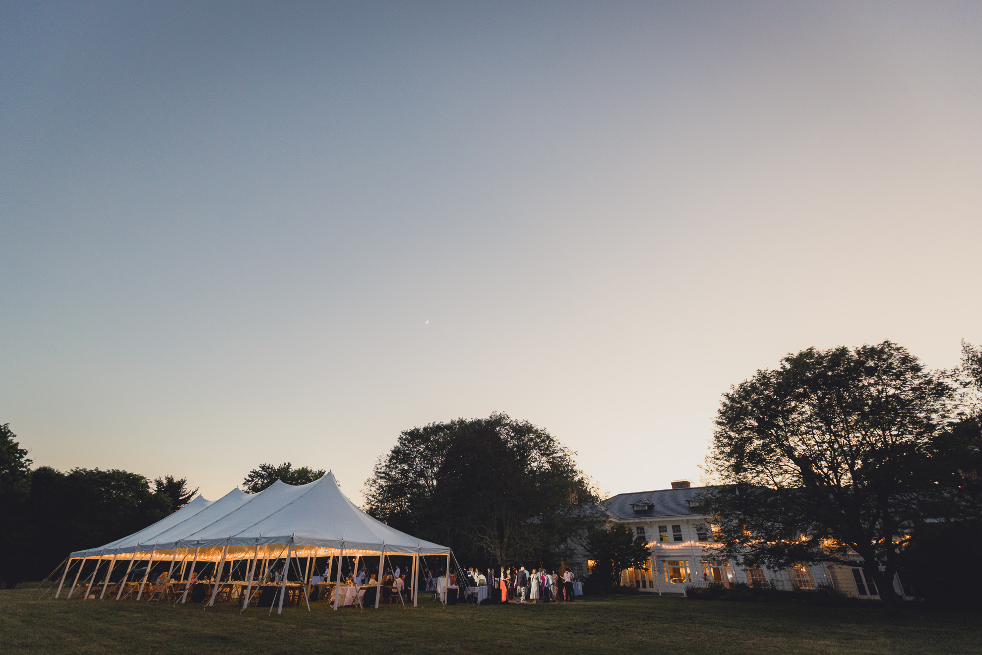 guests dance at outdoor tented wedding reception at Knox Farm in East Aurora, NY