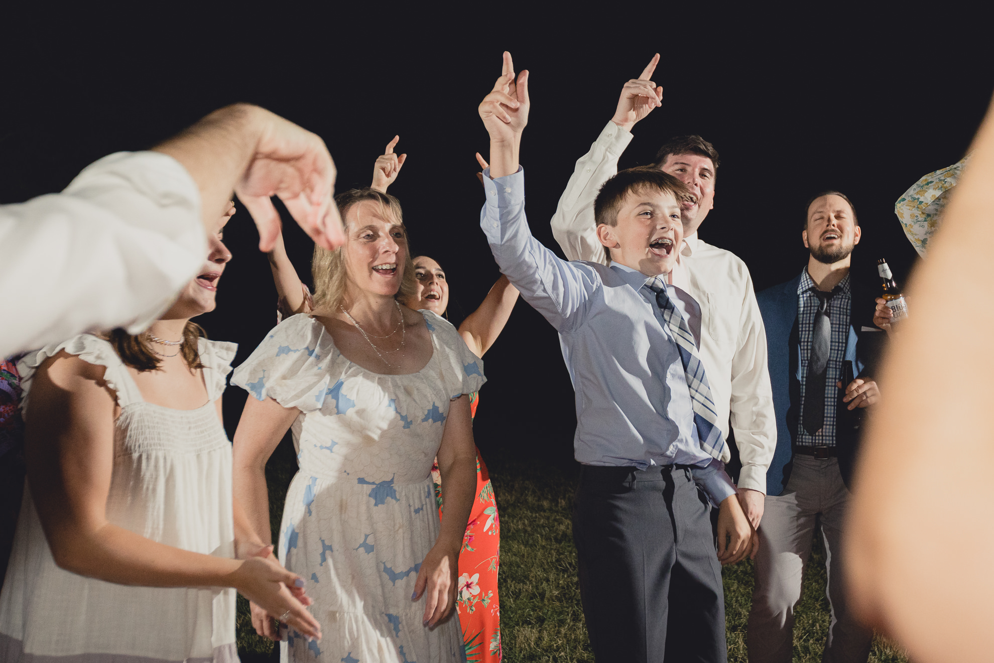 guests dance at outdoor tented wedding reception at Knox Farm in East Aurora, NY