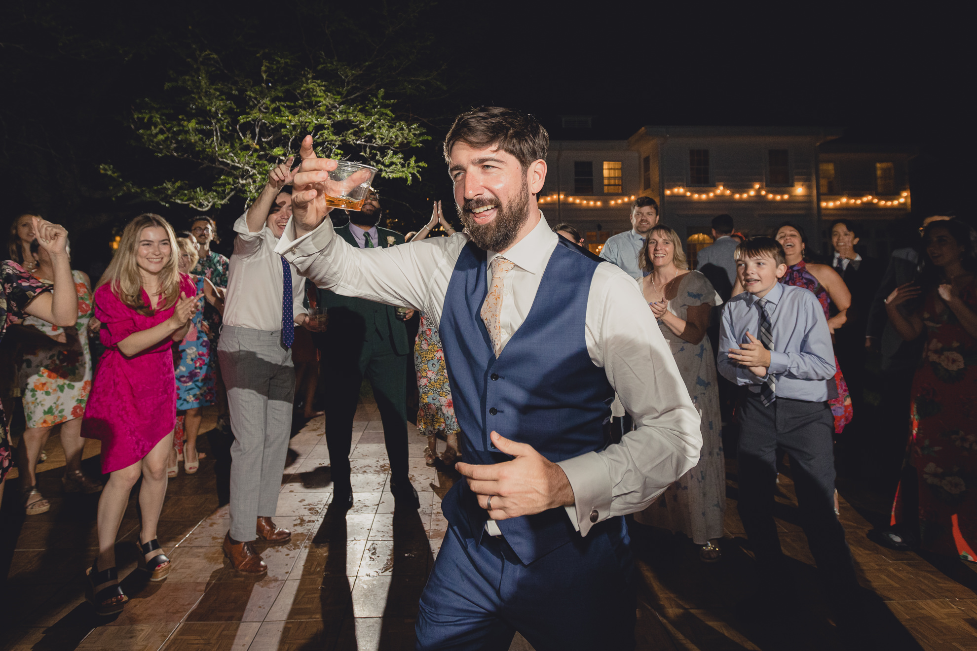 guests dance at outdoor tented wedding reception at Knox Farm in East Aurora, NY
