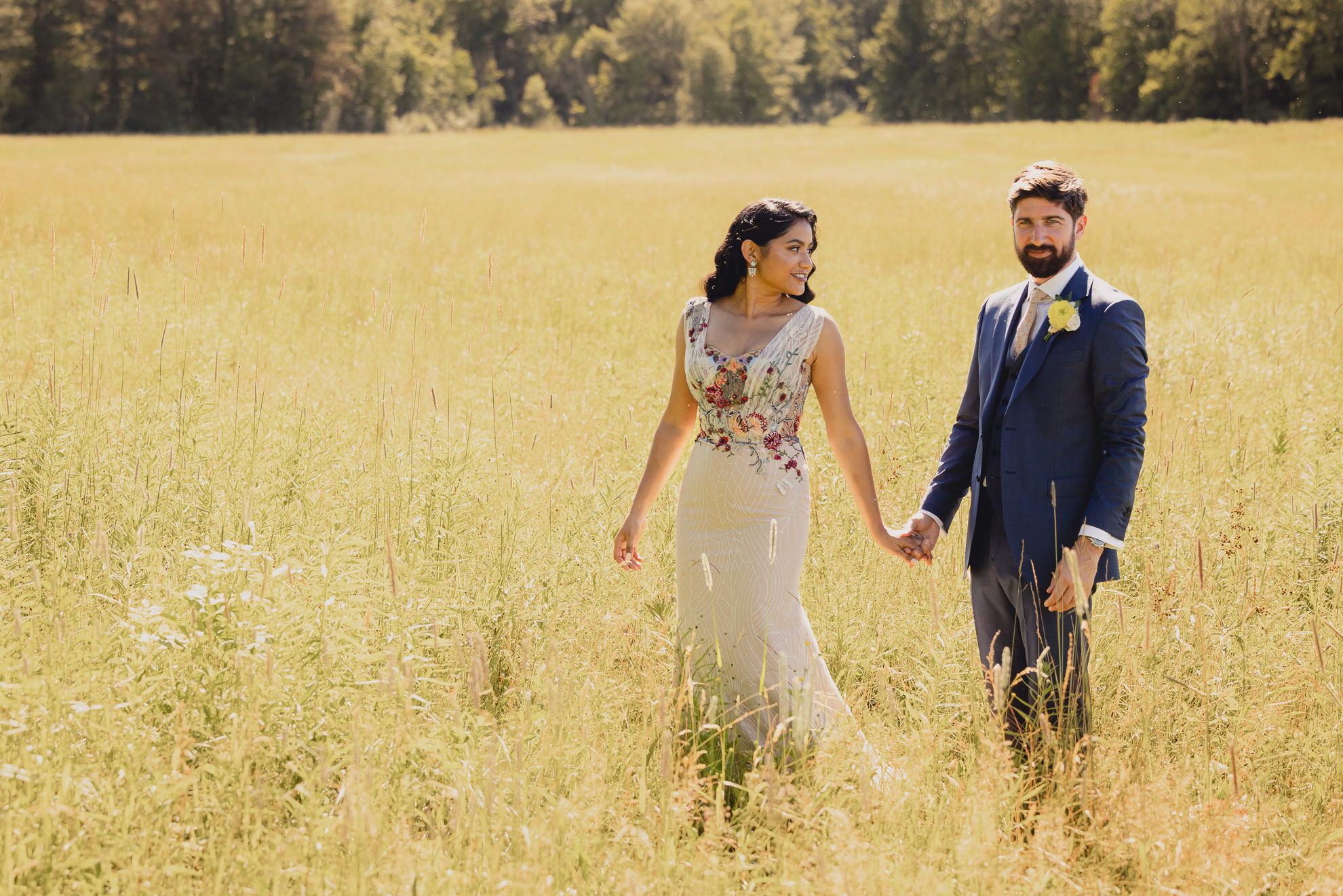 bride and groom pose for portrait after wedding ceremony at mansion at Knox Farm in East Aurora, NY