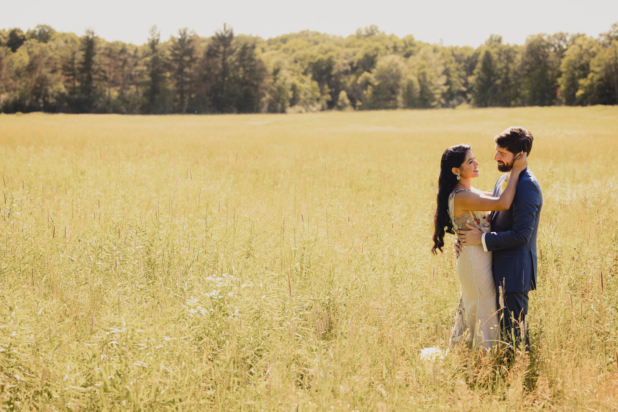 bride and groom pose for portrait after wedding ceremony at mansion at Knox Farm in East Aurora, NY