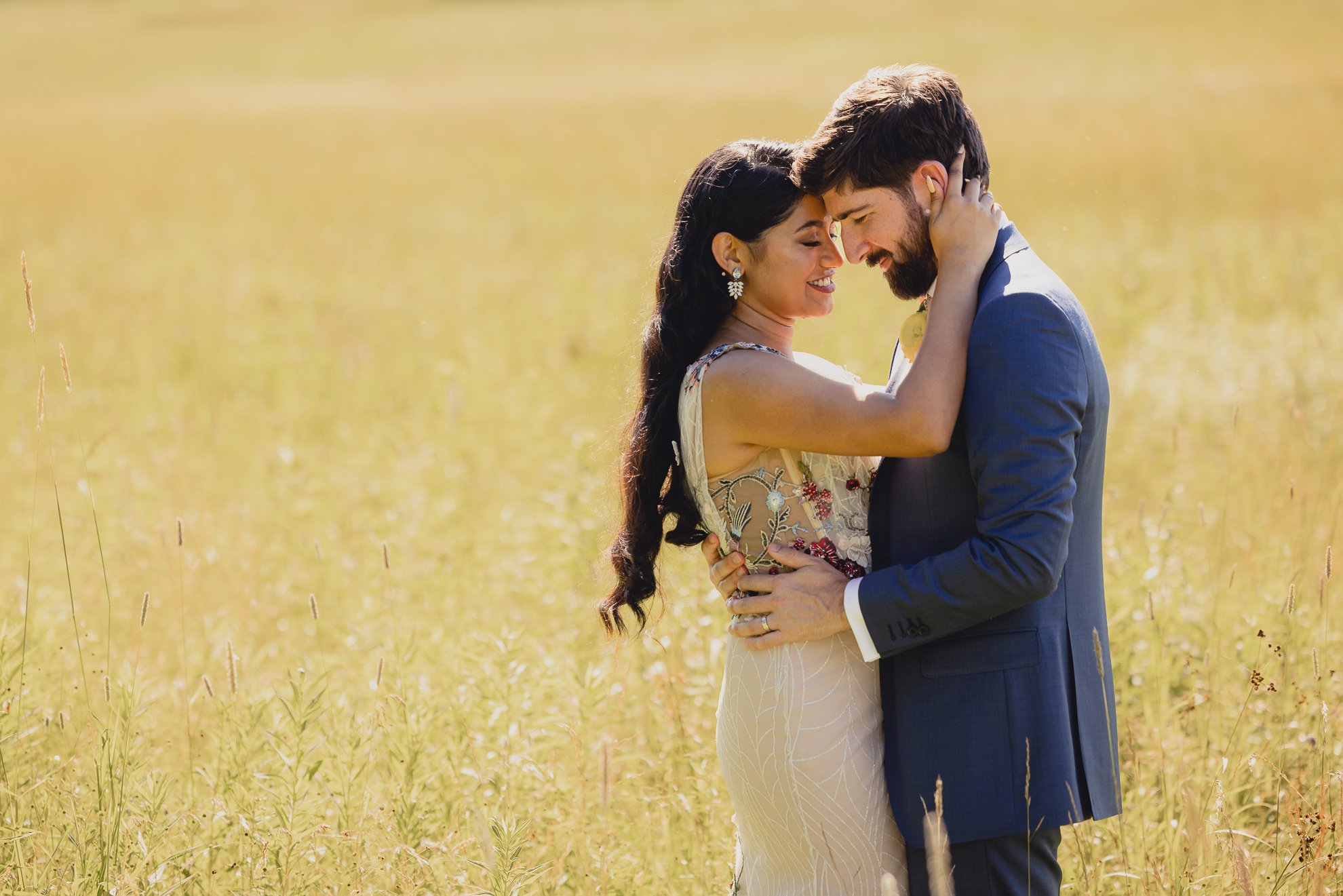 bride and groom pose for portrait after wedding ceremony at mansion at Knox Farm in East Aurora, NY