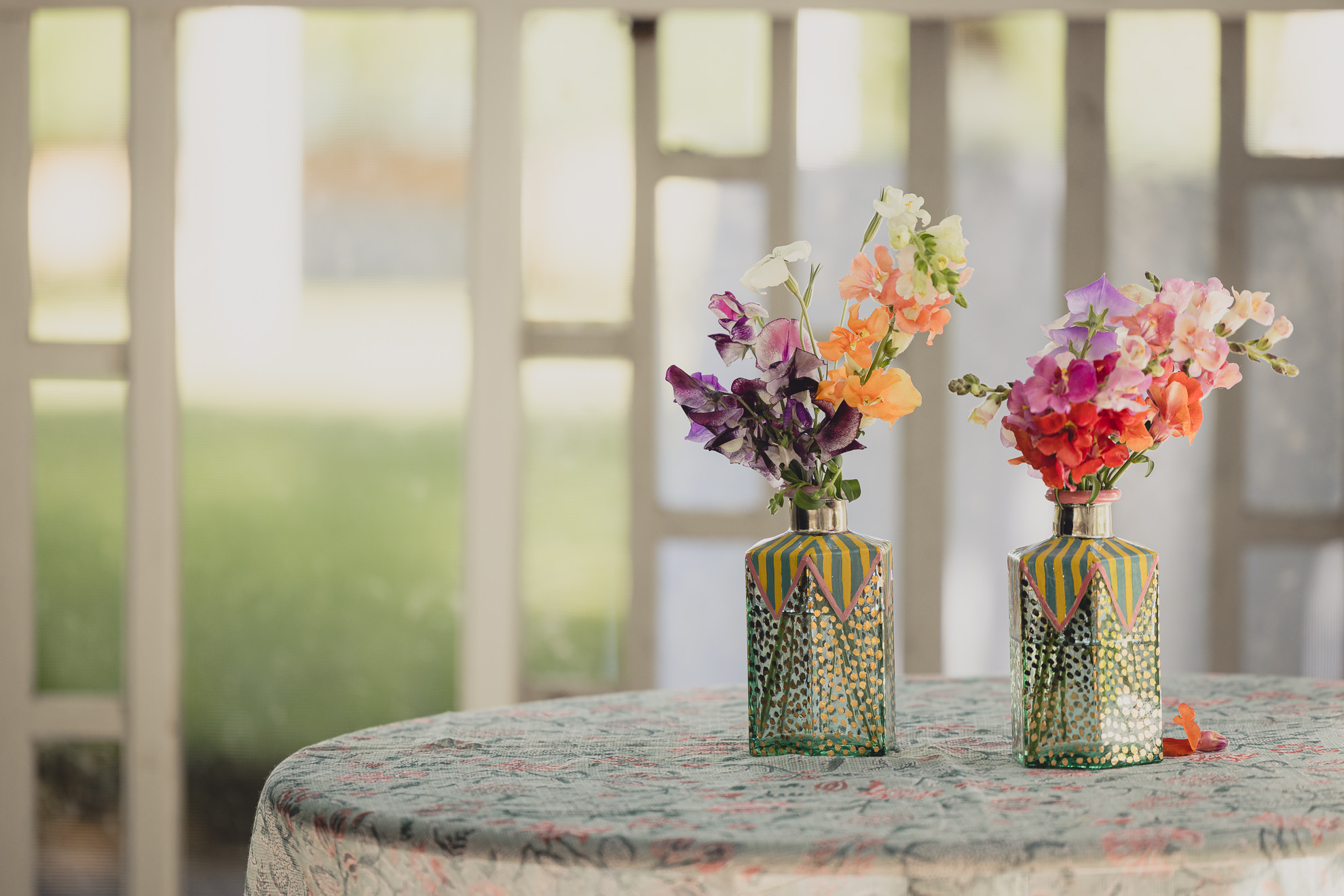 floral decor at outdoor tented wedding reception at Knox Farm in East Aurora, NY