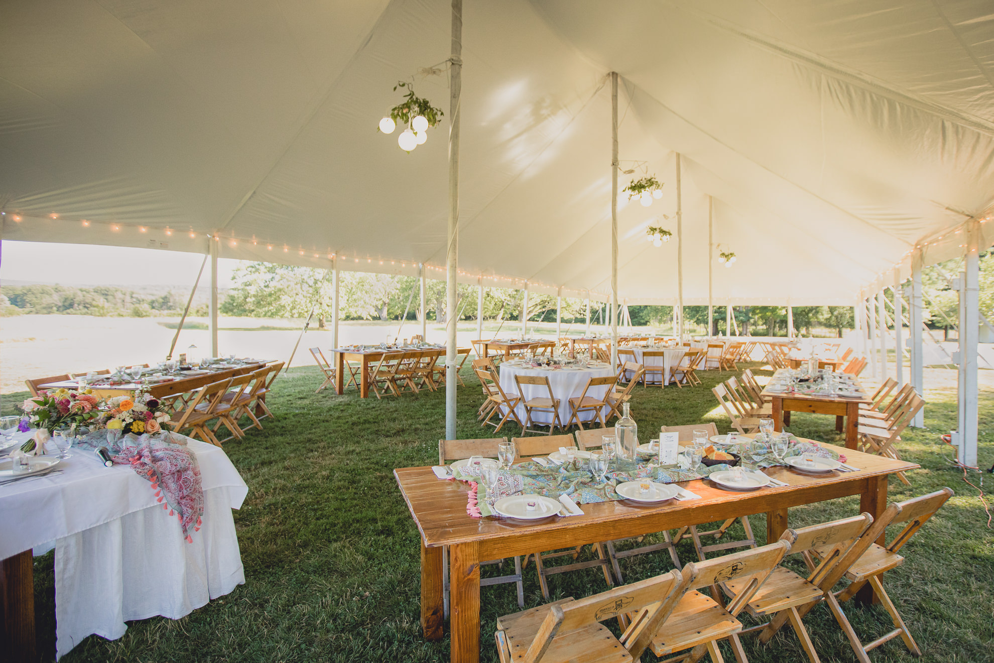 decor at outdoor tented wedding reception at Knox Farm in East Aurora, NY